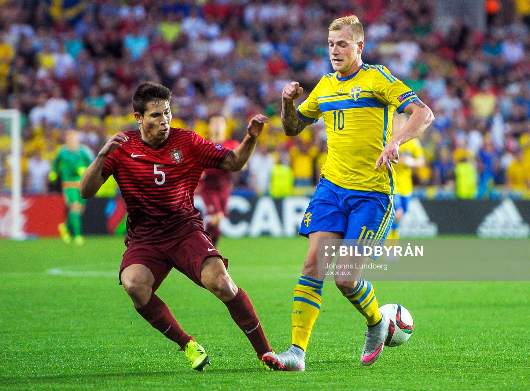 Portugals Raphael Guerreiro och Sveriges John Guidetti