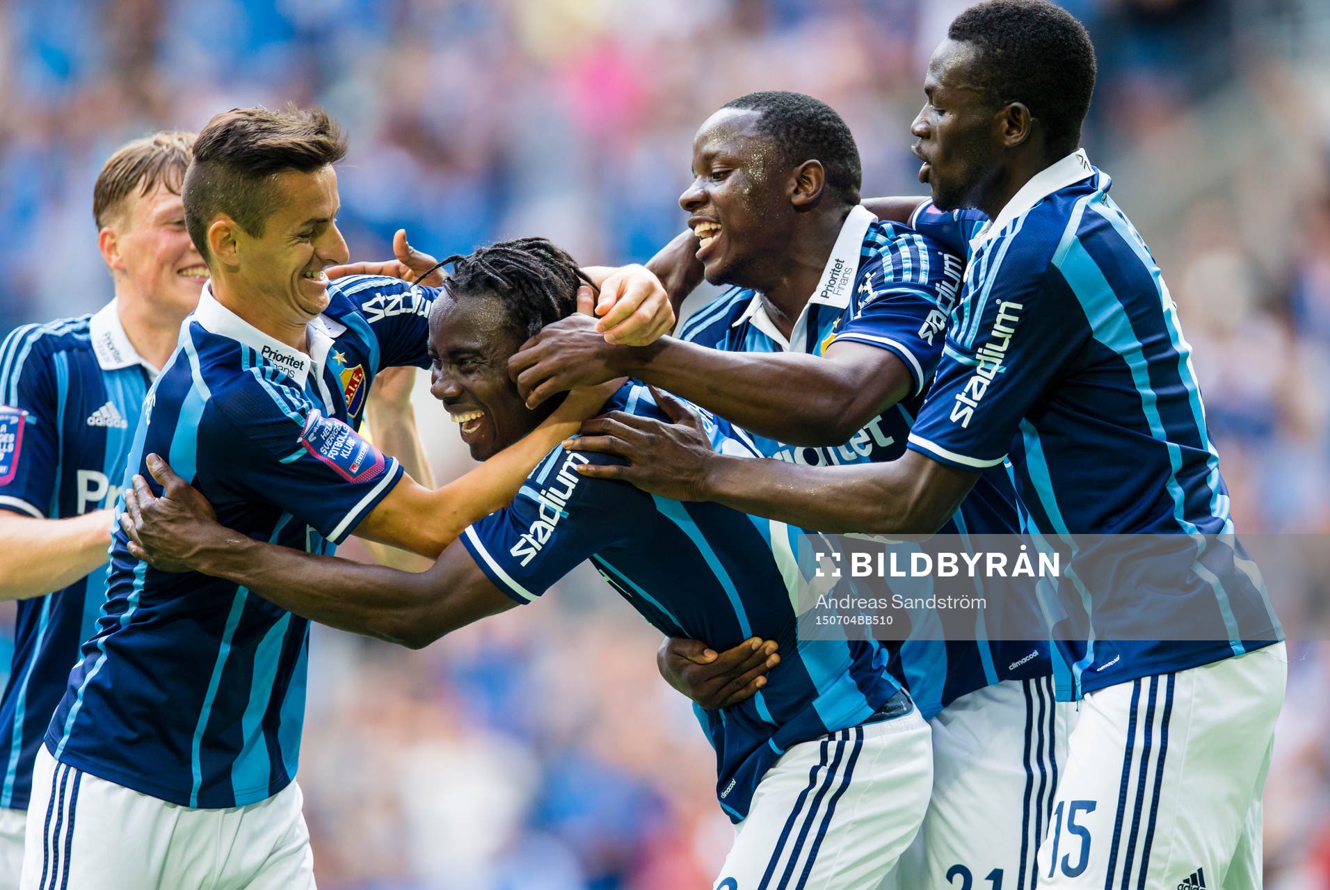 Djurgårdens Sam Johnson (m) gör 2-0 och gratuleras av Emil Bergström (v) , Haris Radetinac , Nyasha Mushekwi och Omar Colley (h)under fotbollsmatchen i Allsvenskan mellan Djurgården och Örebro den 4 Juli 2015 i Stockholm.