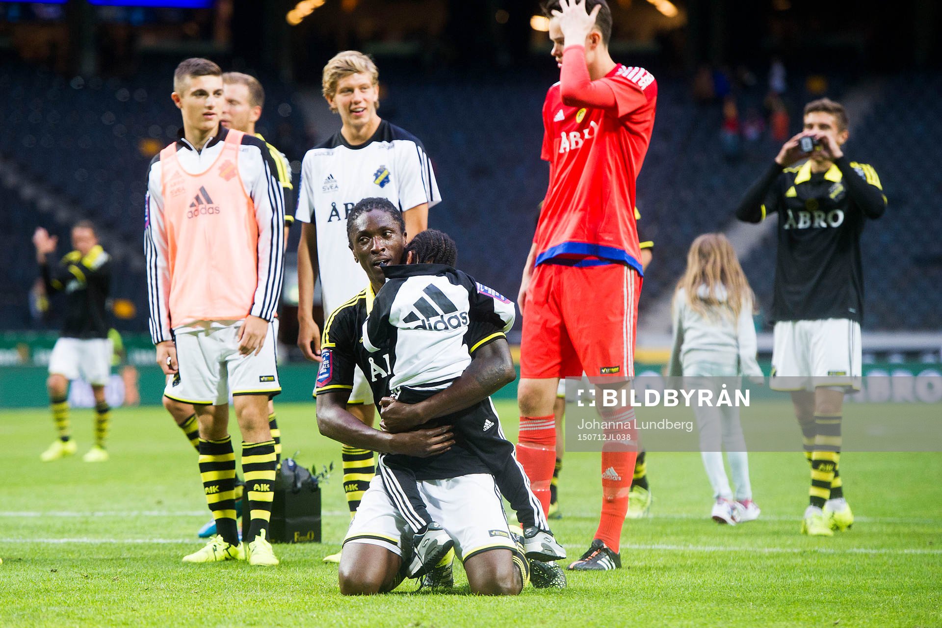 s Dickson Etuhu med sin son