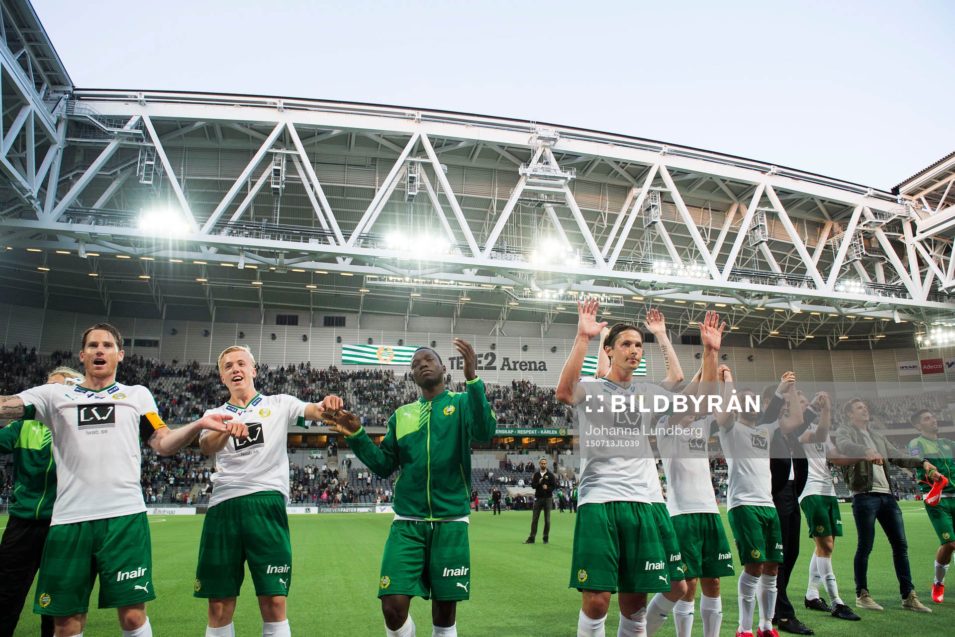Hammarbys Johan Persson, Isac Lidberg, Amadaiya Rennie, Philip Haglund och Kennedy Bakircioglu jublar med lagkamrater efter fotbollsmatchen i Allsvenskan mellan Hammarby och Falkenberg den 13 juli 2015 i Stockholm.