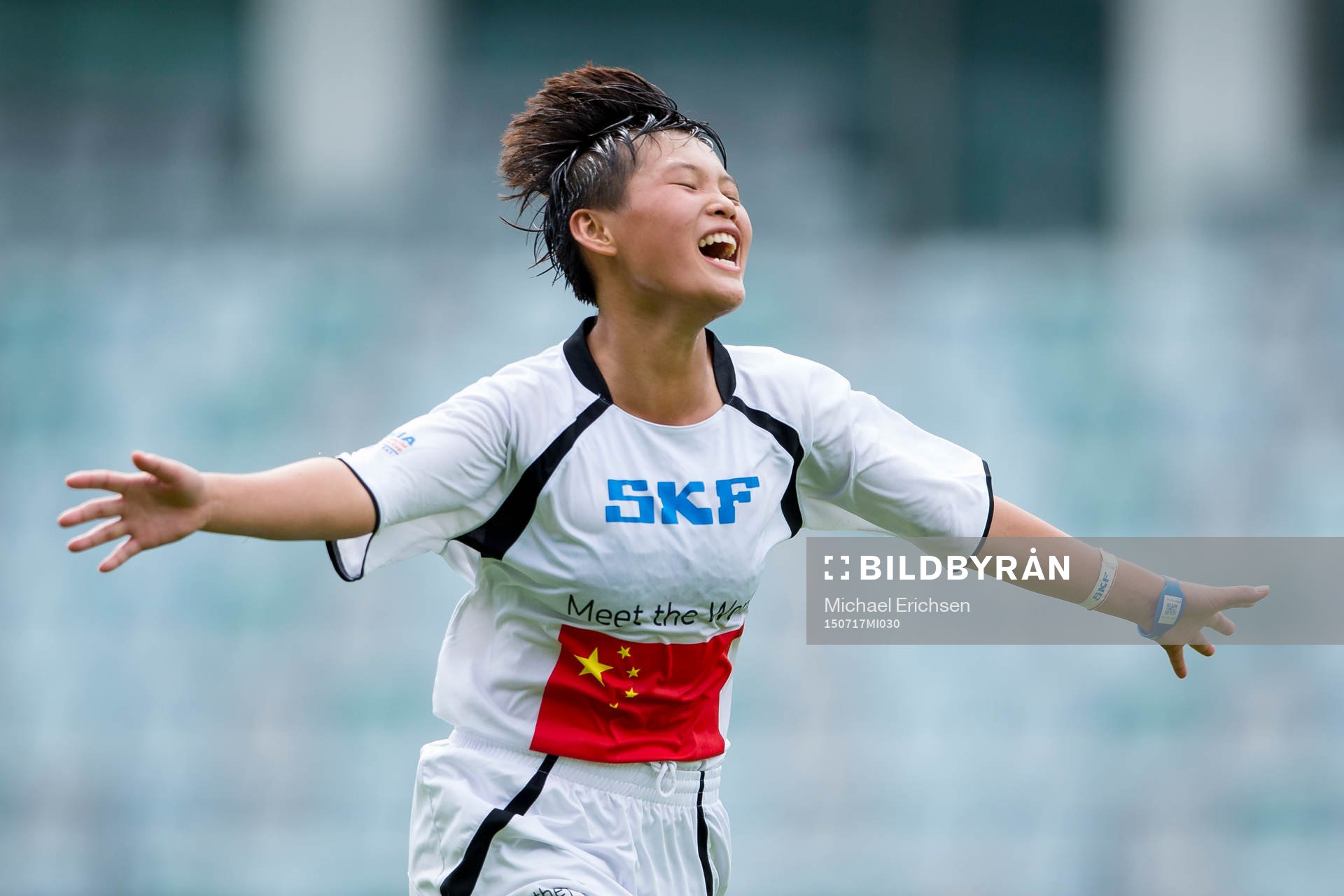 En Hainan Qiongzhong jublar efter mål på straff i G12-finalen i Gothia Cup mellan AIK FF F03 Akademi och Hainan Qiongzhong den 17 juli 2015 i Göteborg