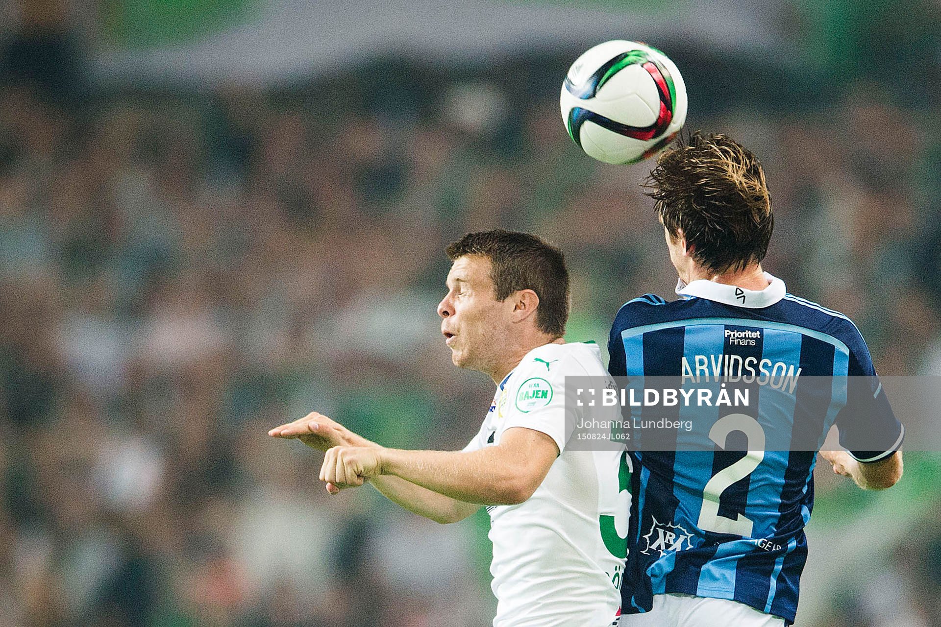 Hammarbys Måns Söderqvist och Djurgårdens Jesper Arvidsson under fotbollsmatchen i Allsvenskan mellan Djurgården och Hammarby den 24 augusti 2015 i Stockholm. 