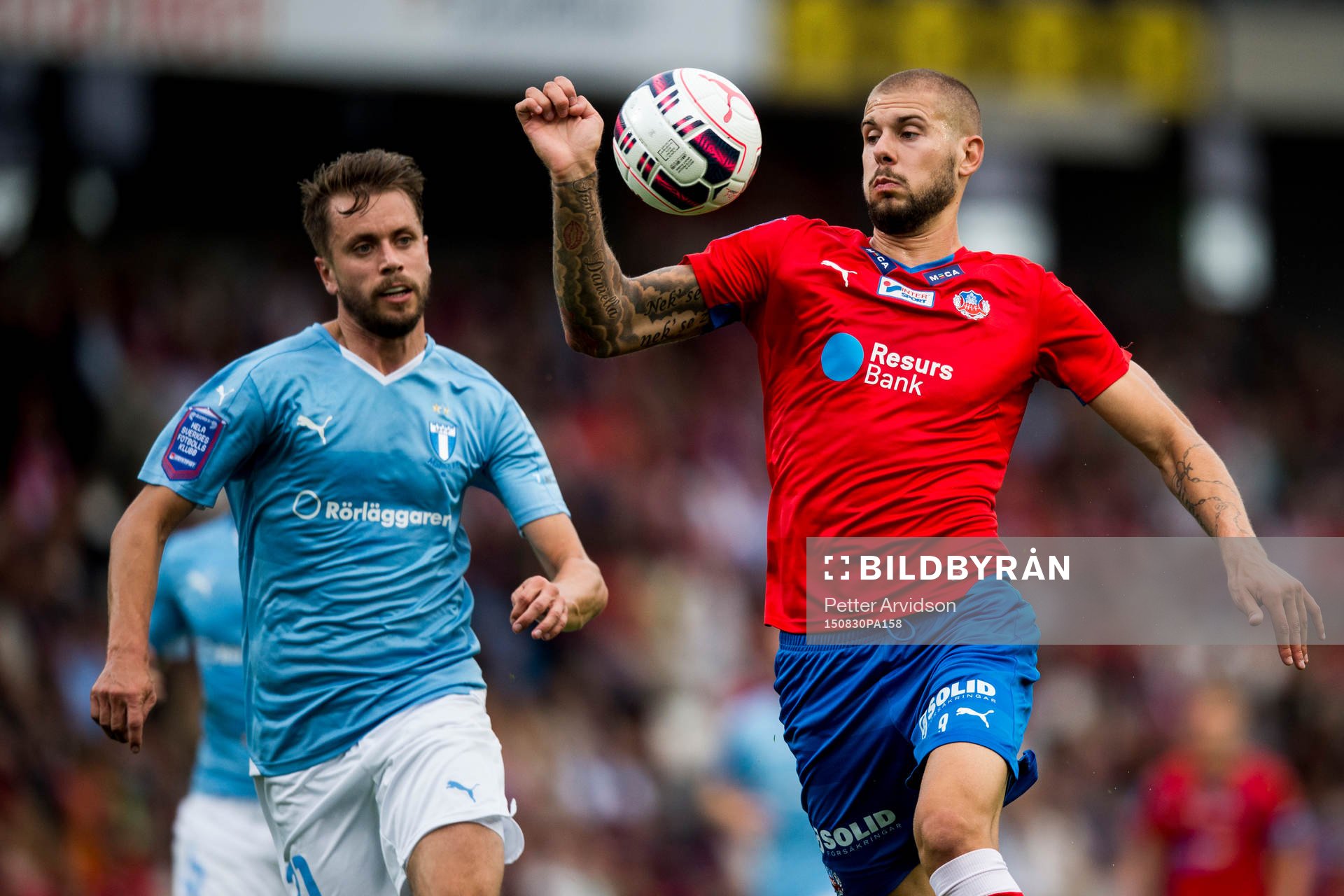 Malmö FFs Kari Arnason och Helsingborgs Robin Simovic