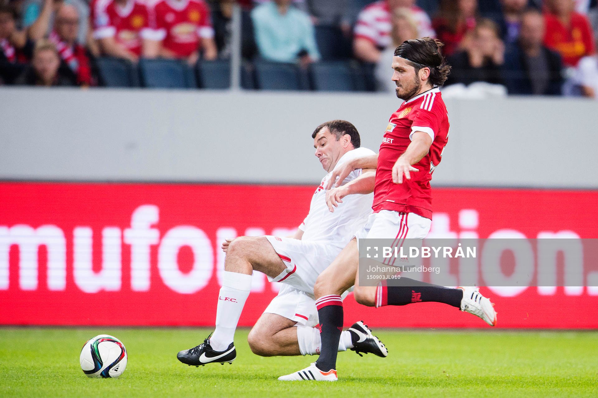 Liverpools Steve Harkness och Manchester Uniteds Bojan