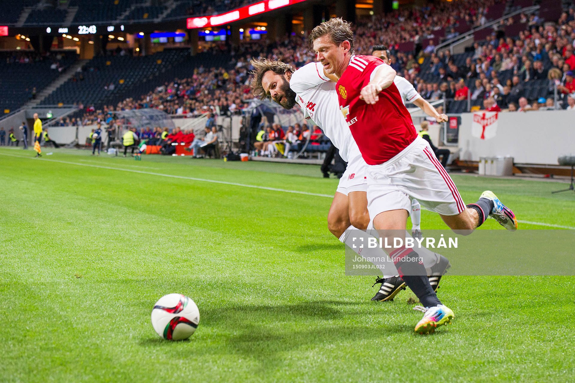 Liverpools Patrik Berger och Manchester Uniteds Jesper
