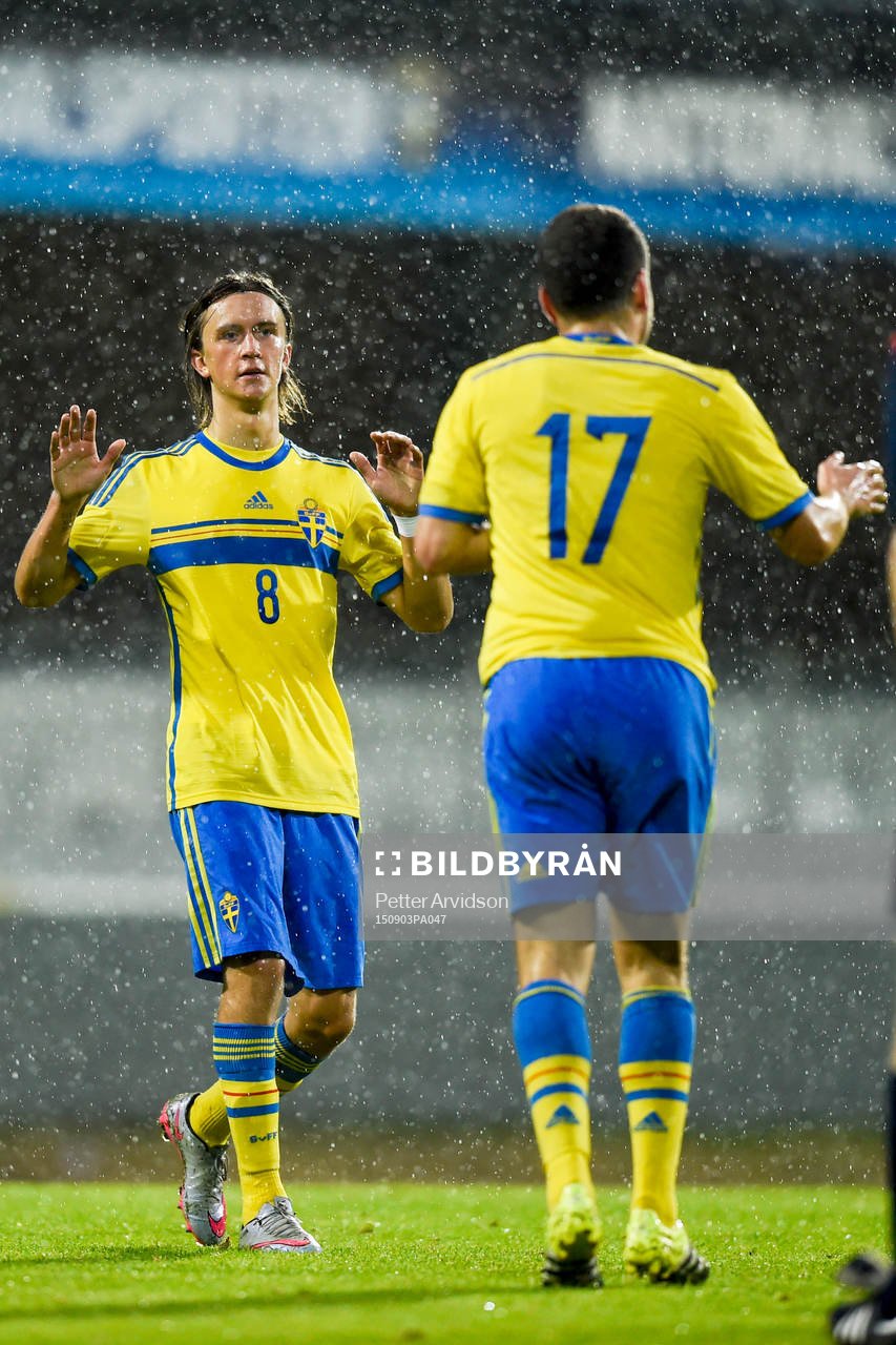 Sveriges Kristoffer Olsson och Kerim Mrabti jublar
