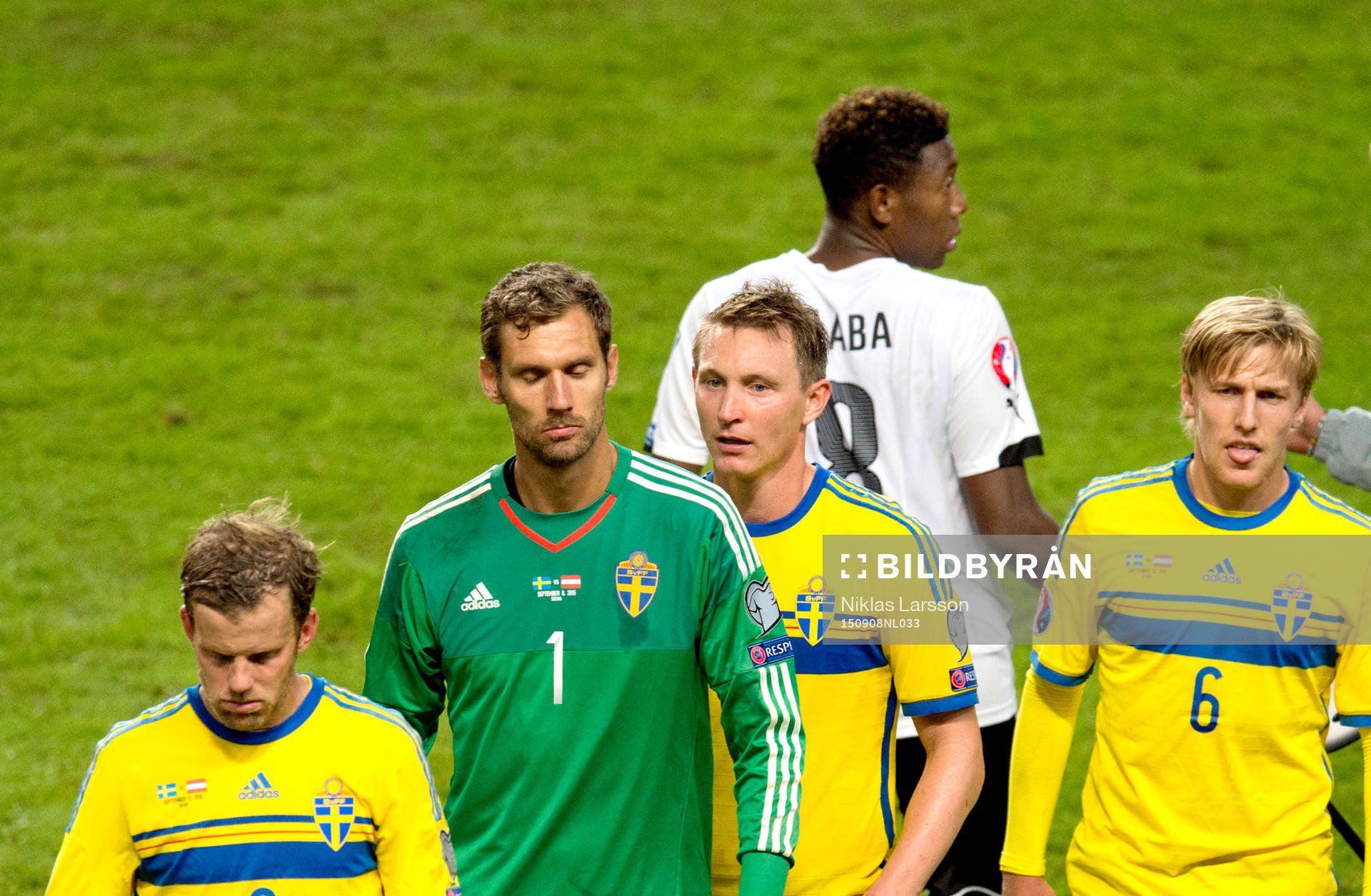 Sveriges Mikael Antonsson, målvakt Andreas Isaksson, Kim