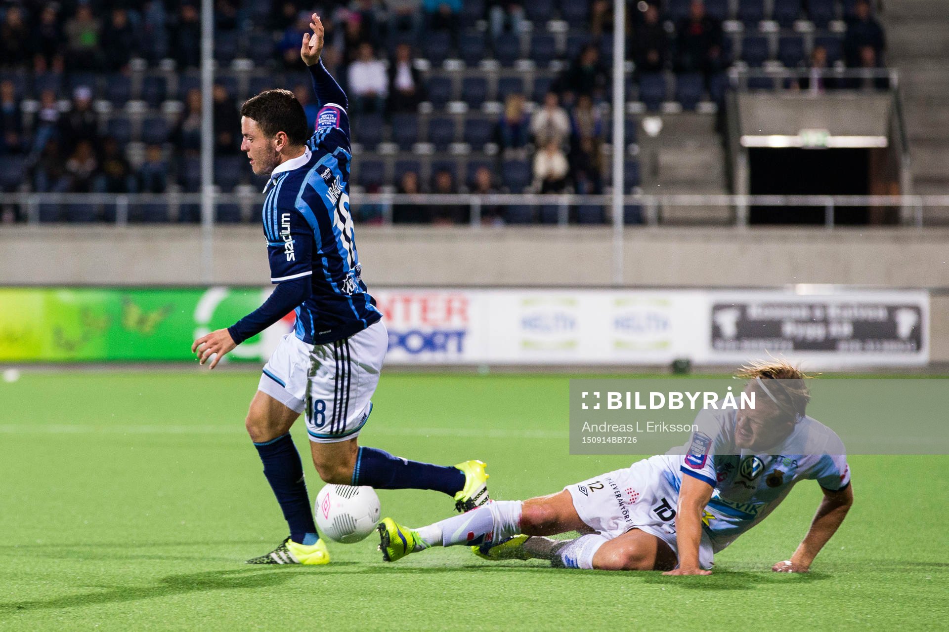 Djurgårdens Kerim Mrabti går omkull i en närkamp med