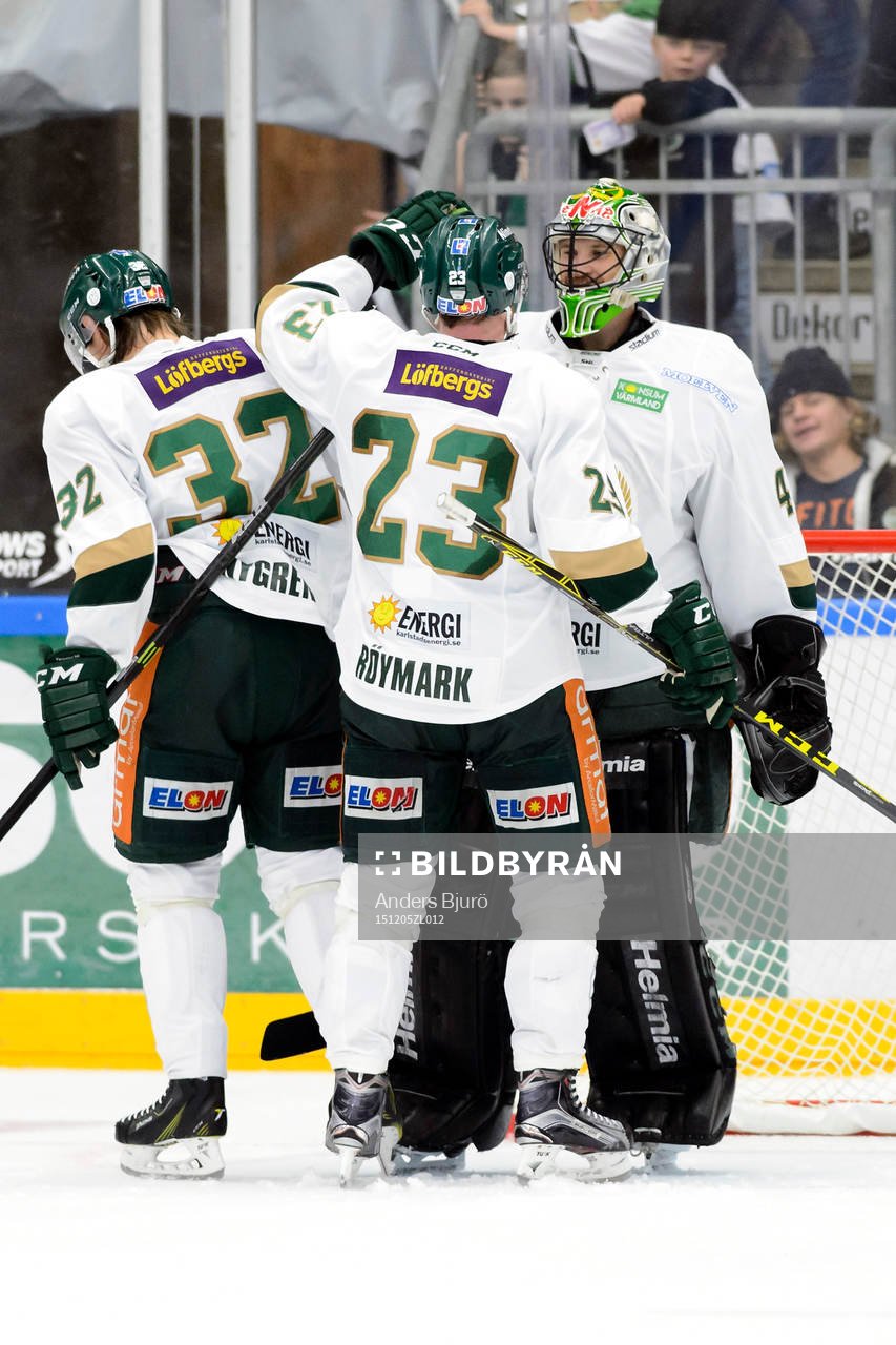 Färjestads Martin Röymark jublar med målvakt Justin Pogge