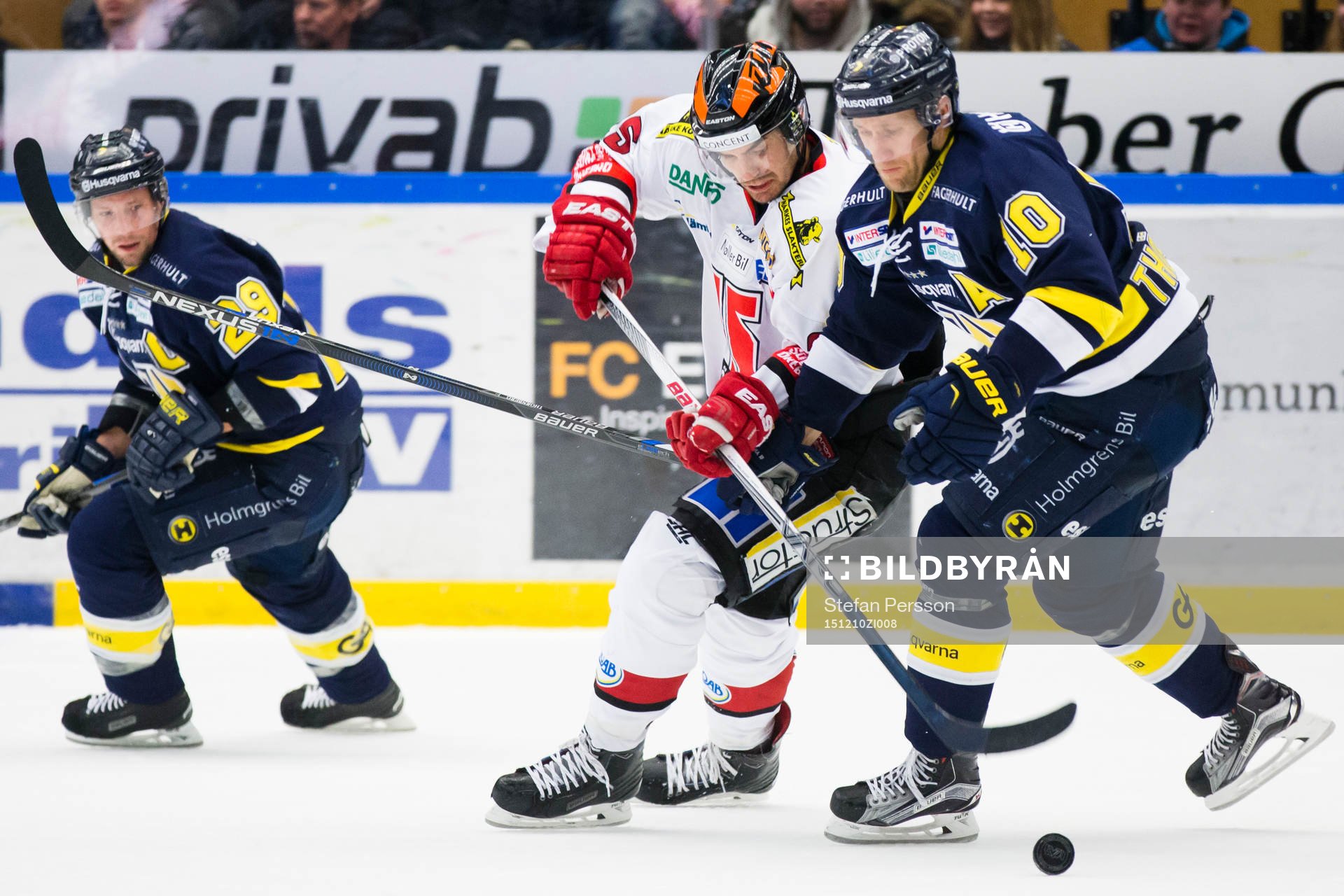 s Chris Abbott, Martin Johansson och HV71:s Martin