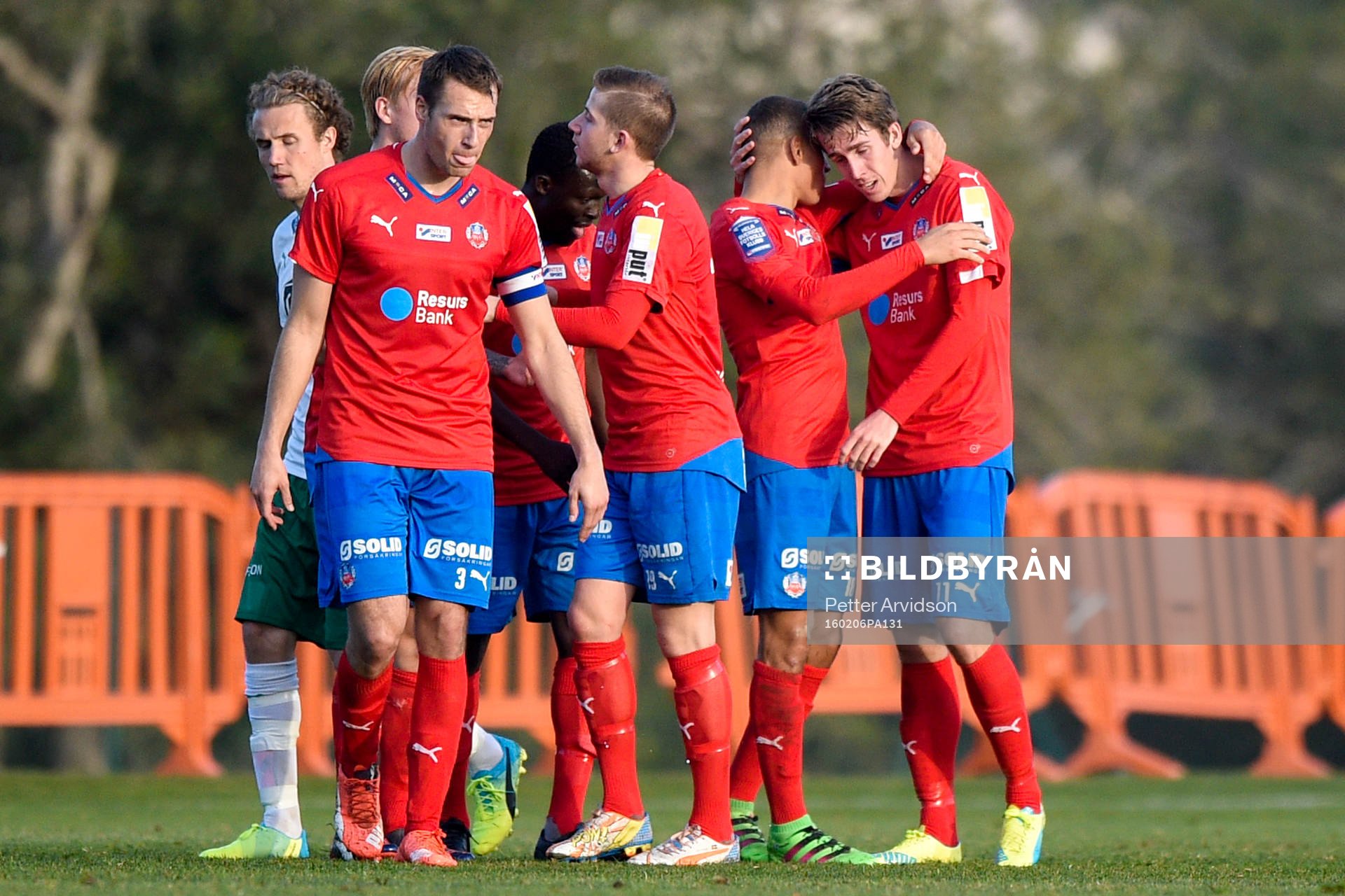 Helsingborgs Jordan Larsson kramar om Adam Eriksson efter 2-0 under en träningsmatch i fotboll mellan Helsingborg och Hammarby den 6 februari 2016 i Salou.