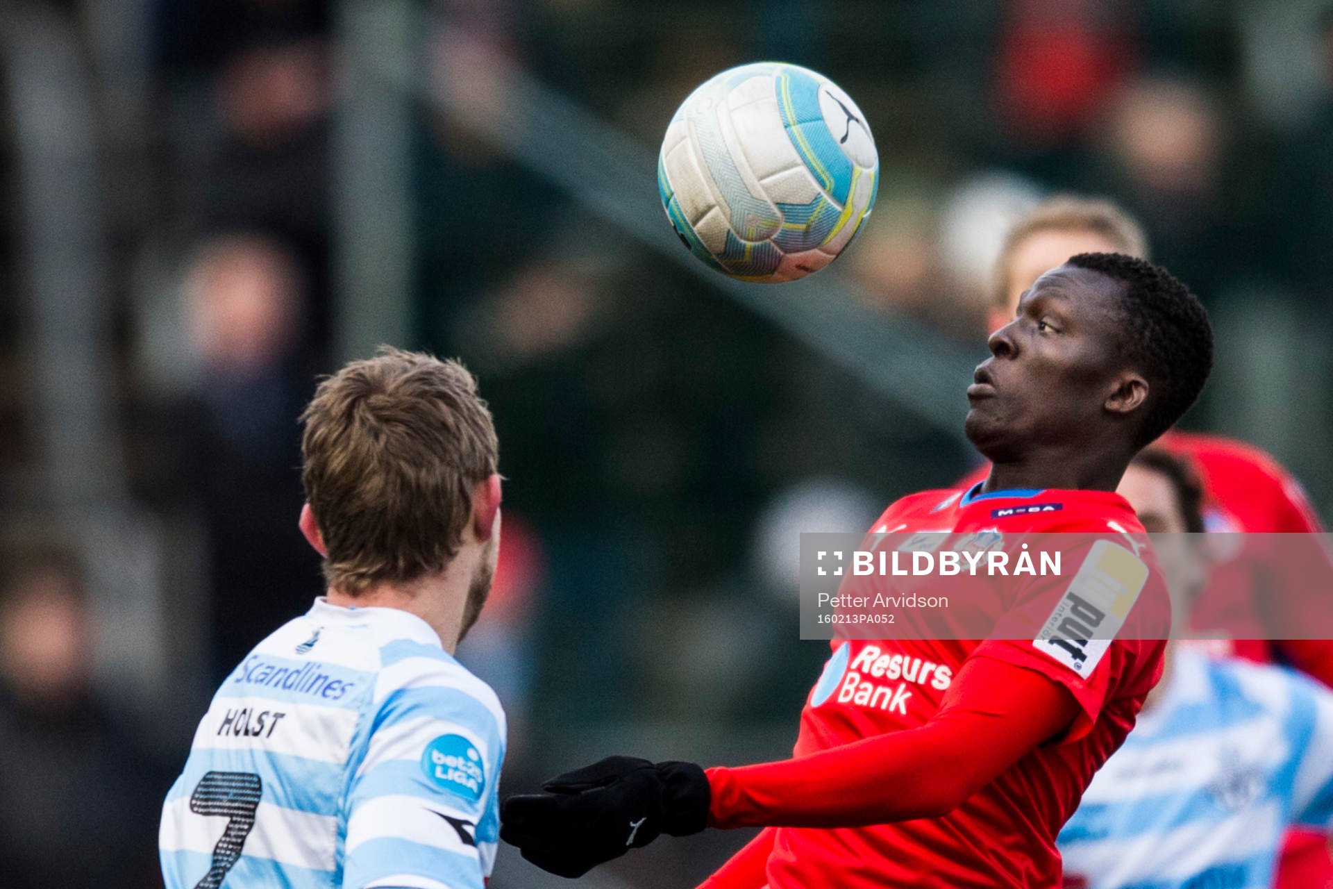 Helsingborgs Lalawélé Atakora och Helsingörs Anders Holst under en träningsmatch i fotboll mellan Helsingborg och Helsingör den 13 februari 2016 i Helsingborg.