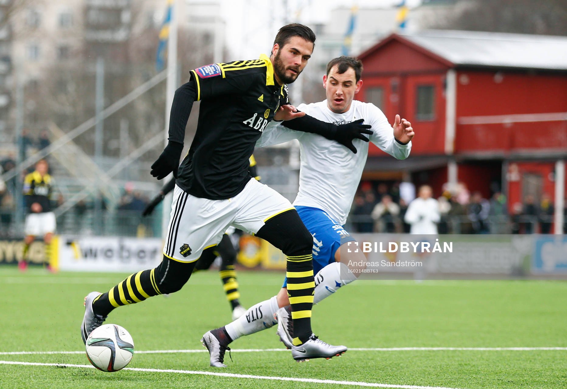 AIK:s Denni Avdic i kamp om bollen med Norrköpings Nikola Tkalcic under träningsmatchen i fotboll mellan AIK och Norrköping den 14 Februari 2016 i Stockholm.