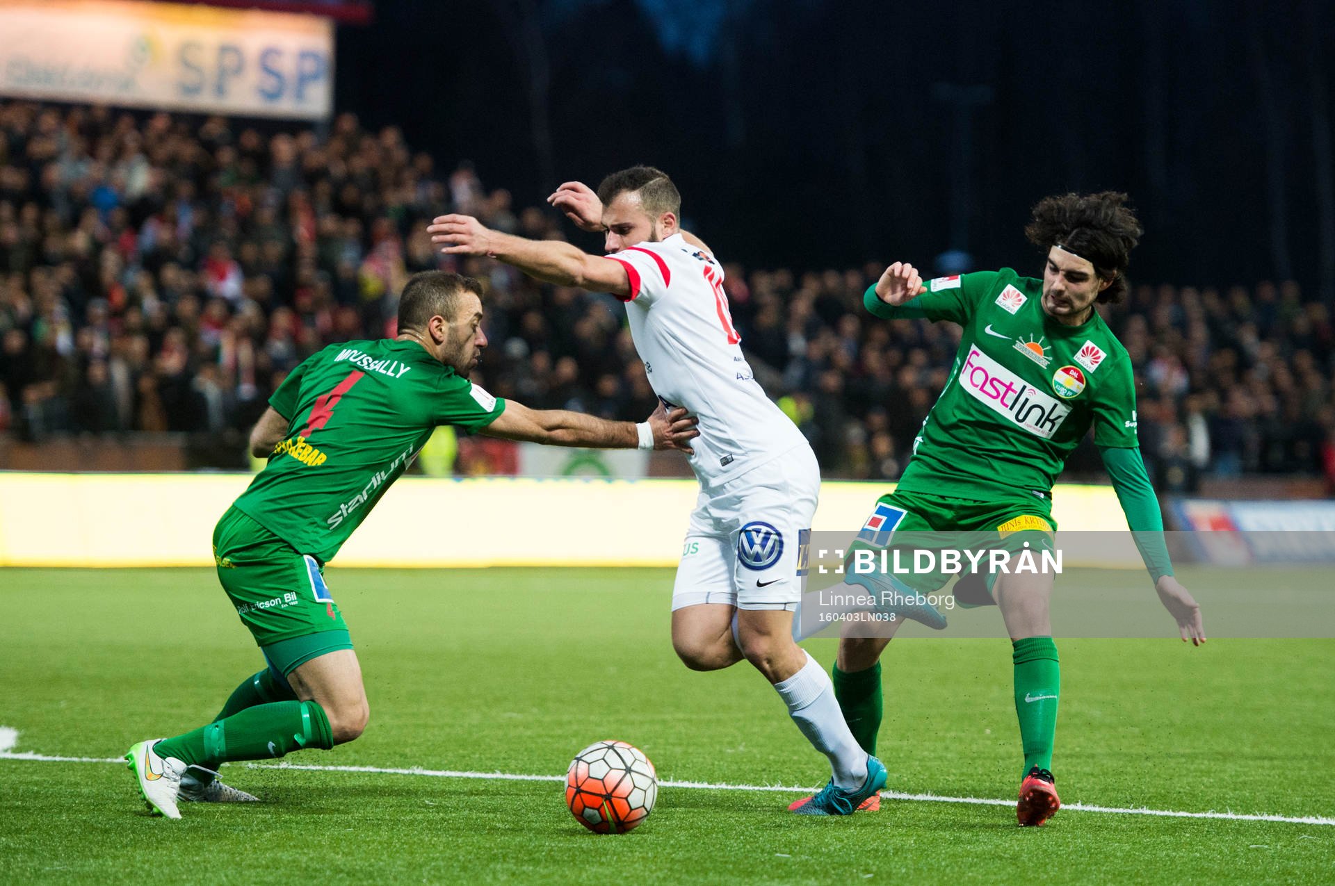 Assyriskas Mattias Genc blir fälld av Dalkurds Diego Montiel under fotbollsmatchen i Superettan mellan Assyriska och Dalkurd den 3 april 2016 i Södertälje.