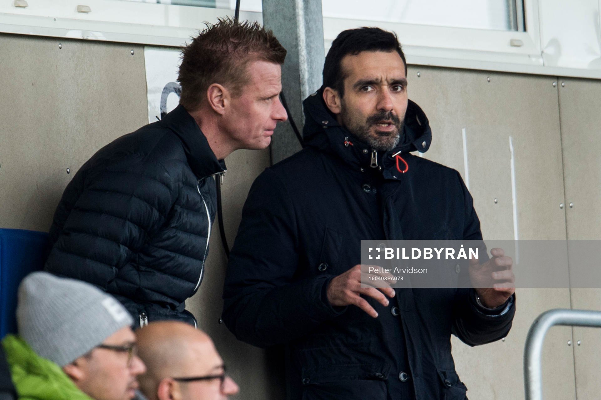 Ängelholms sportchef Stavros Papadopoulos (th) på läktaren under fotbollsmatchen i Superettan mellan Ängelholm och Syrianska den 3 april 2016 i Ängelholm.