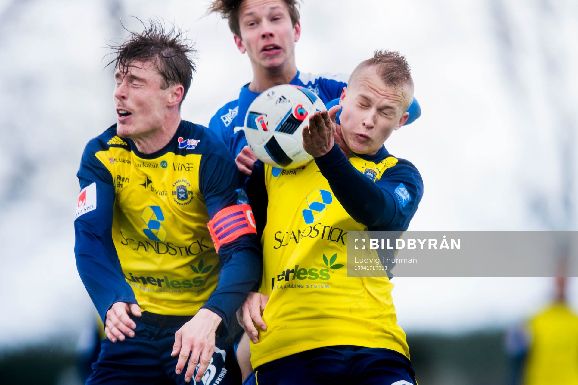 Ängelholms Marcus Bernholtz och Christian Ljungberg i kamp om bollen med Halmstads Simon Silverholt under fotbollsmatchen i Superettan mellan Ängelholm och Halmstad den 17 april 2016 i Ängelholm.