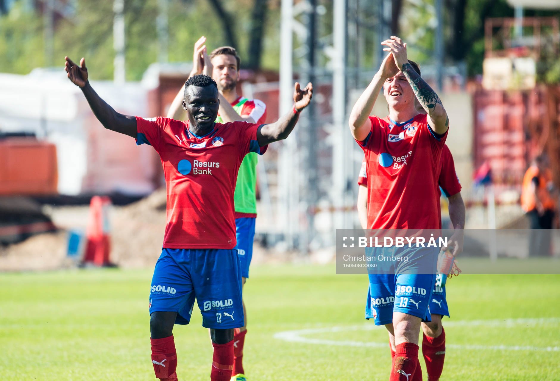 Helsingborgs Lalawélé Atakora och Alexander Achinioti-Jönsson jublar efter vinsten i fotbollsmatchen i Allsvenskan mellan Helsingborg och Malmö FF den 8 maj 2016 i Helsingborg.