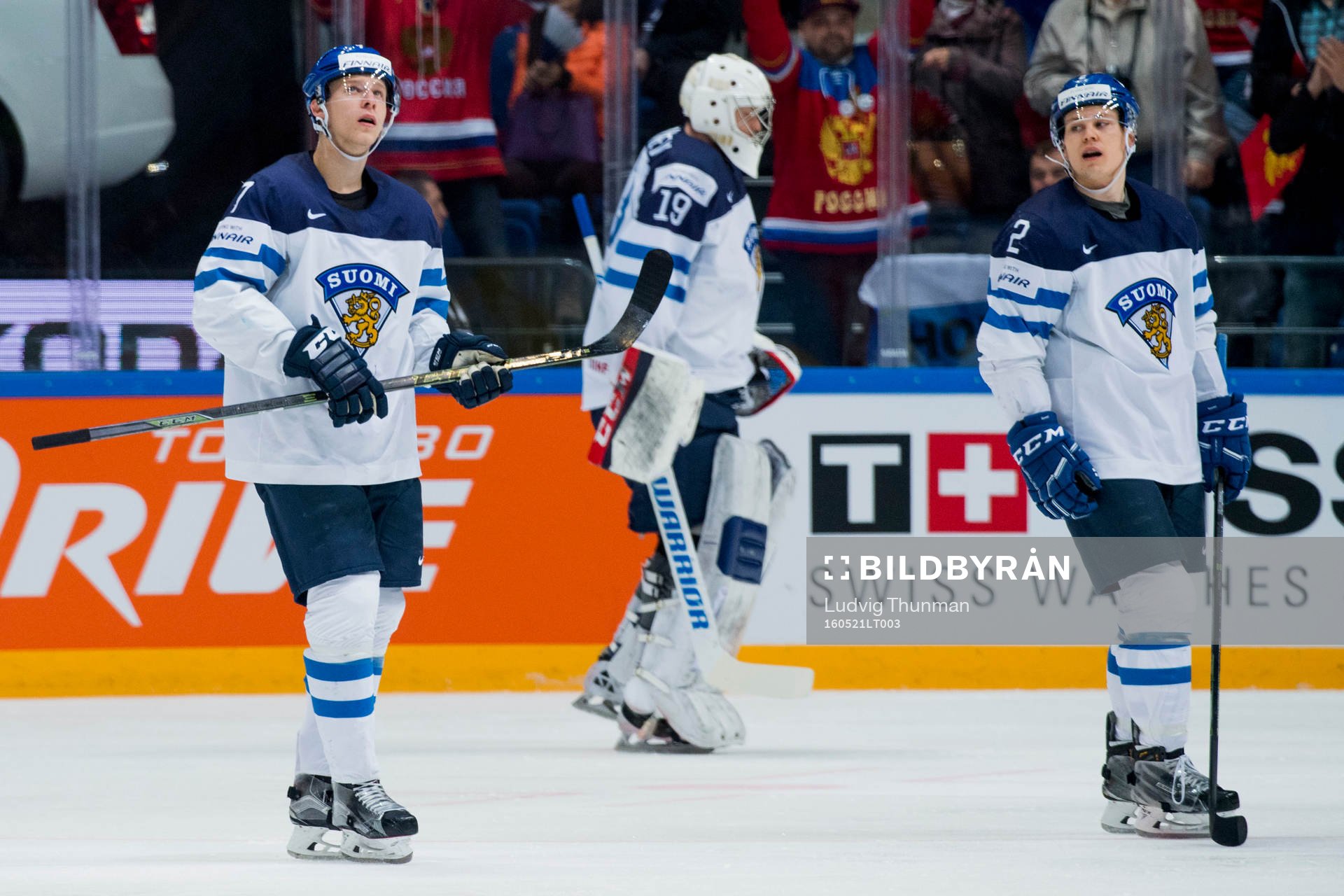 Finlands Esa Lindell, målvakt Mikko Koskinen och Ville