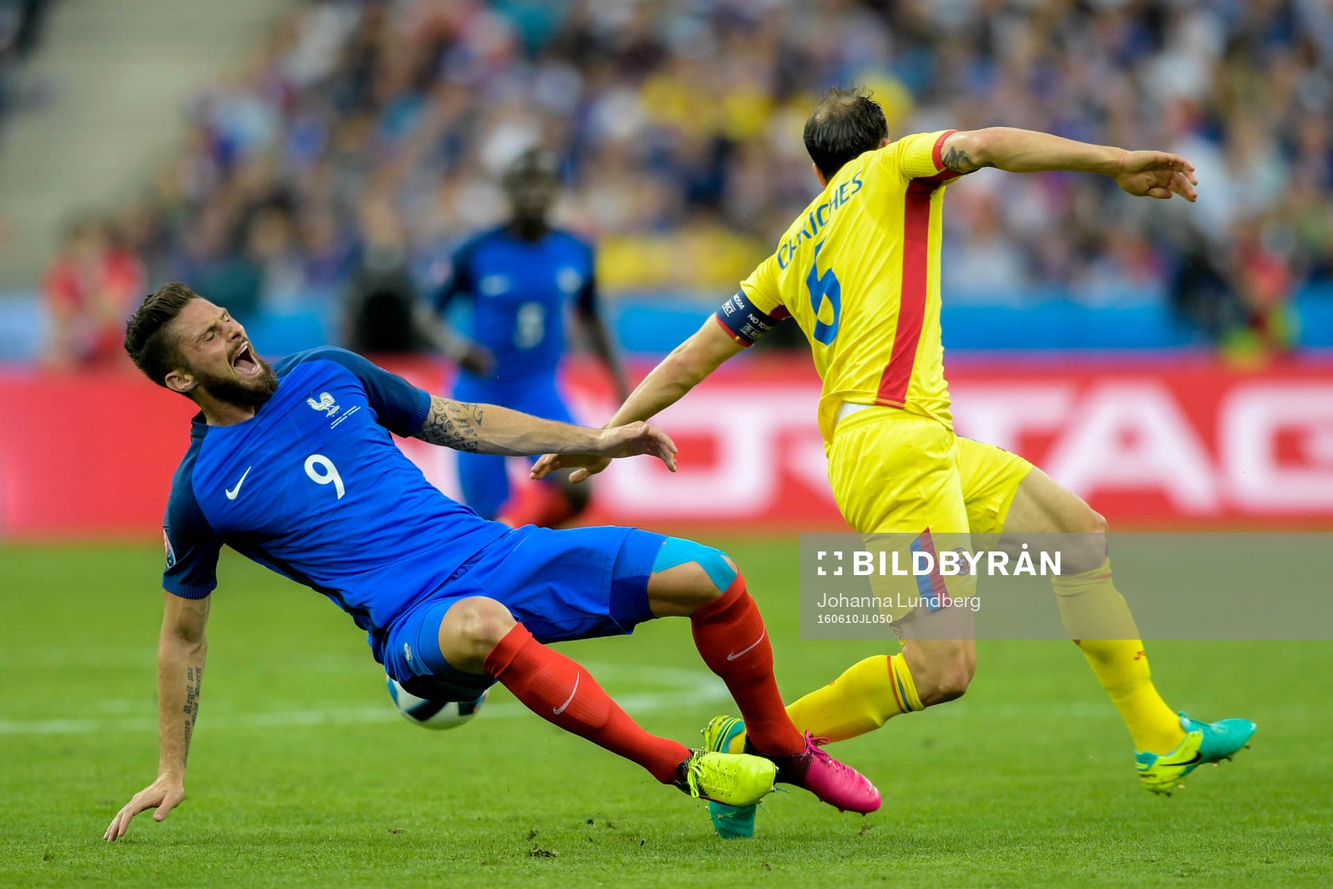 Frankrikes Olivier Giroud och Rumäniens Ovidiu Hoban