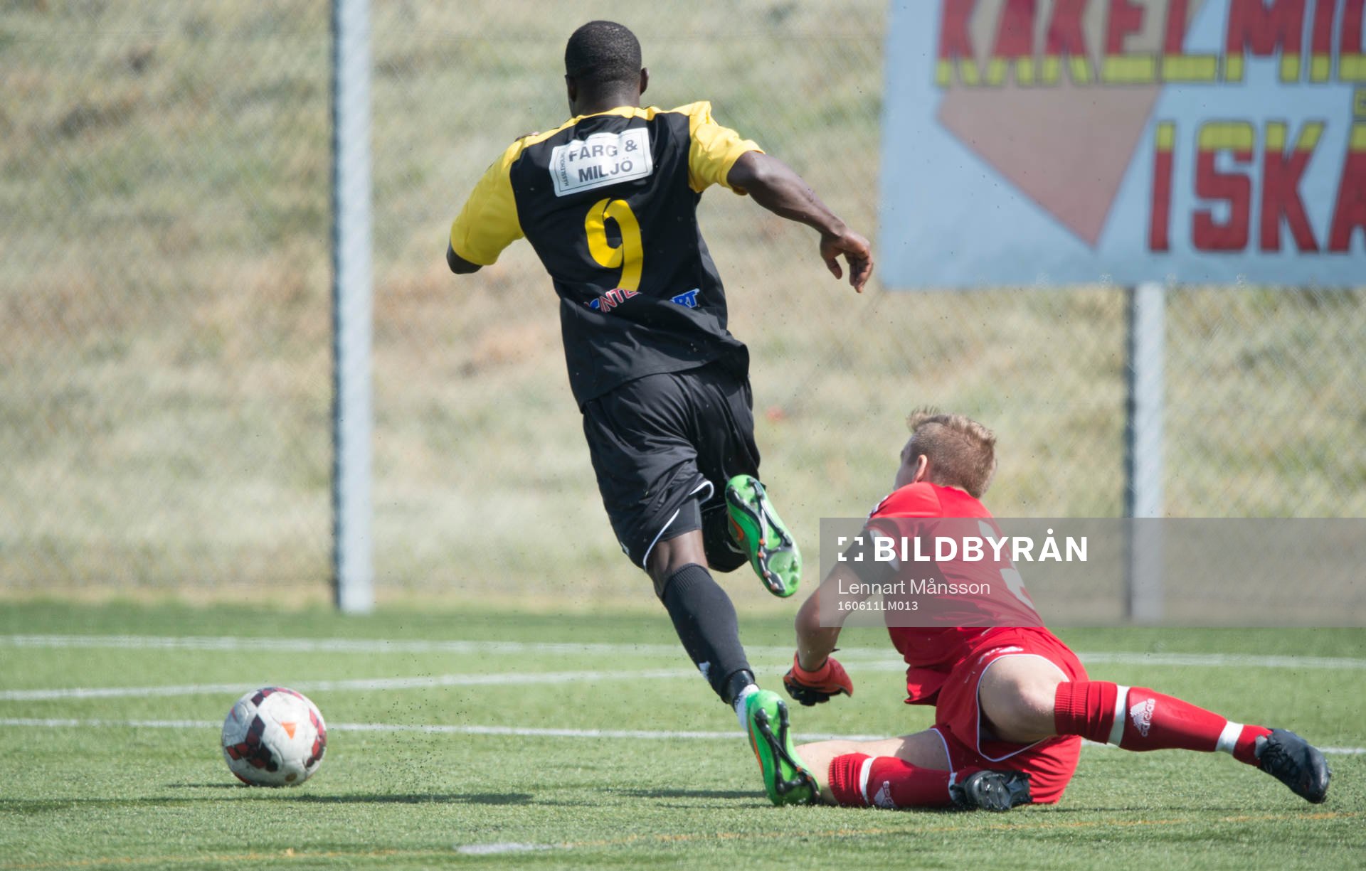 IFK Hässleholms Mike Andrew fälls av målvakten och skulle haft straff, men istället blir han varnad i matchen i division 2 mellan Kvarnby och IFK Hässleholm i Malmö 11 juni 2016.