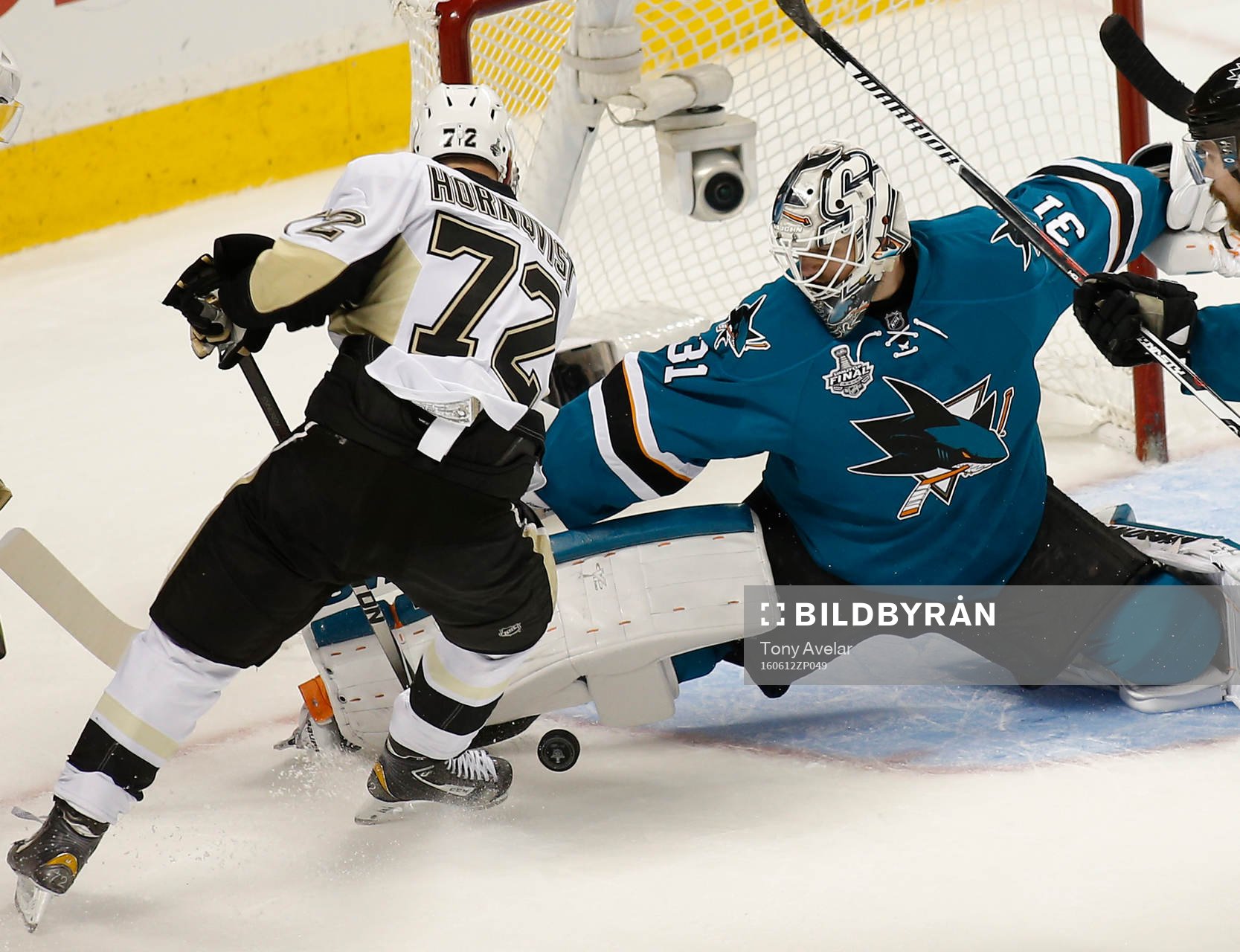 San Jose Sharks goalie Martin Jones (31) blocks a shot by