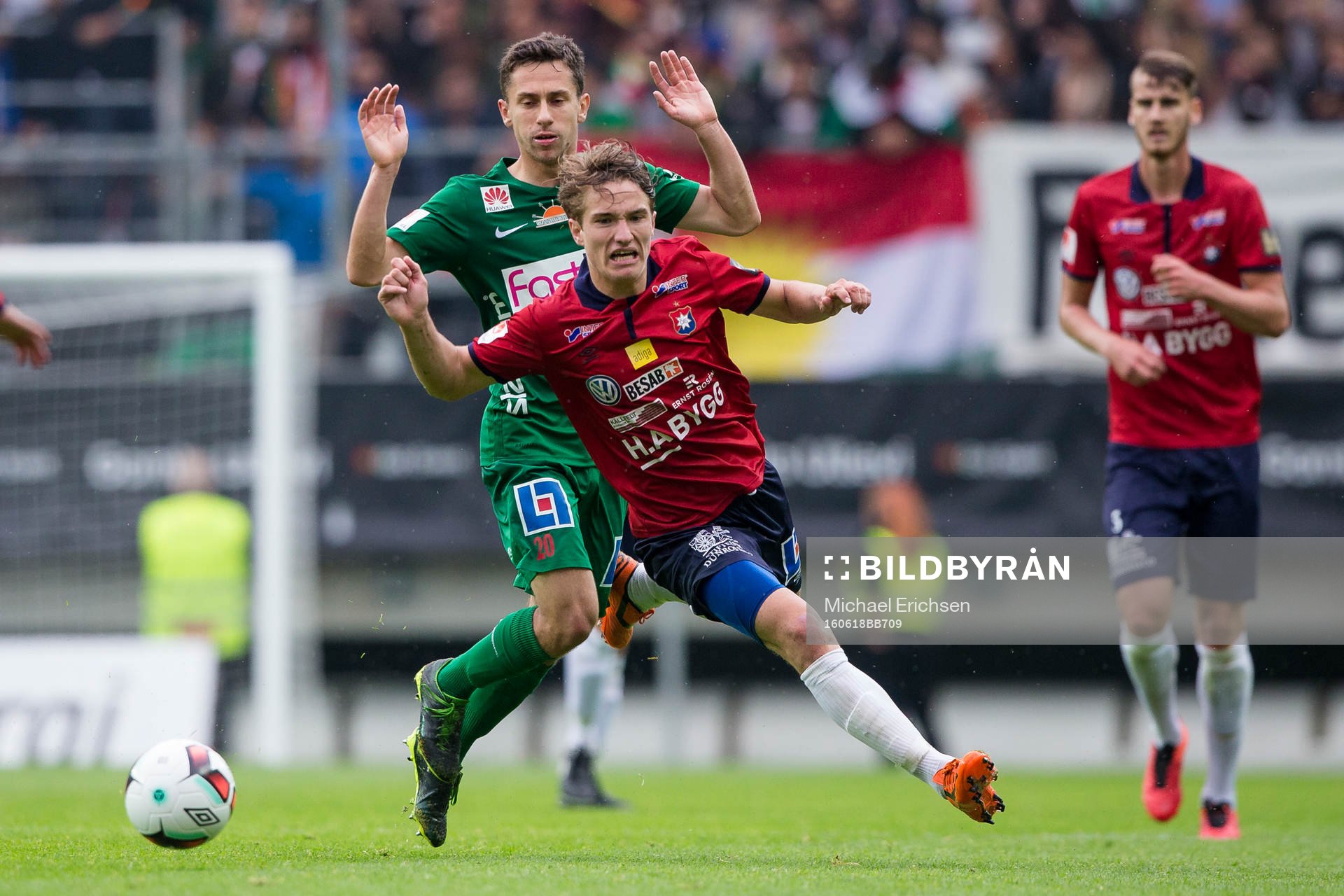 Örgrytes Jakob Lindström faller i närkamp med Predrag Randelovic under fotbollsmatchen i Superettan mellan Örgryte och Dalkurd den 18 juni 2016 i Göteborg.