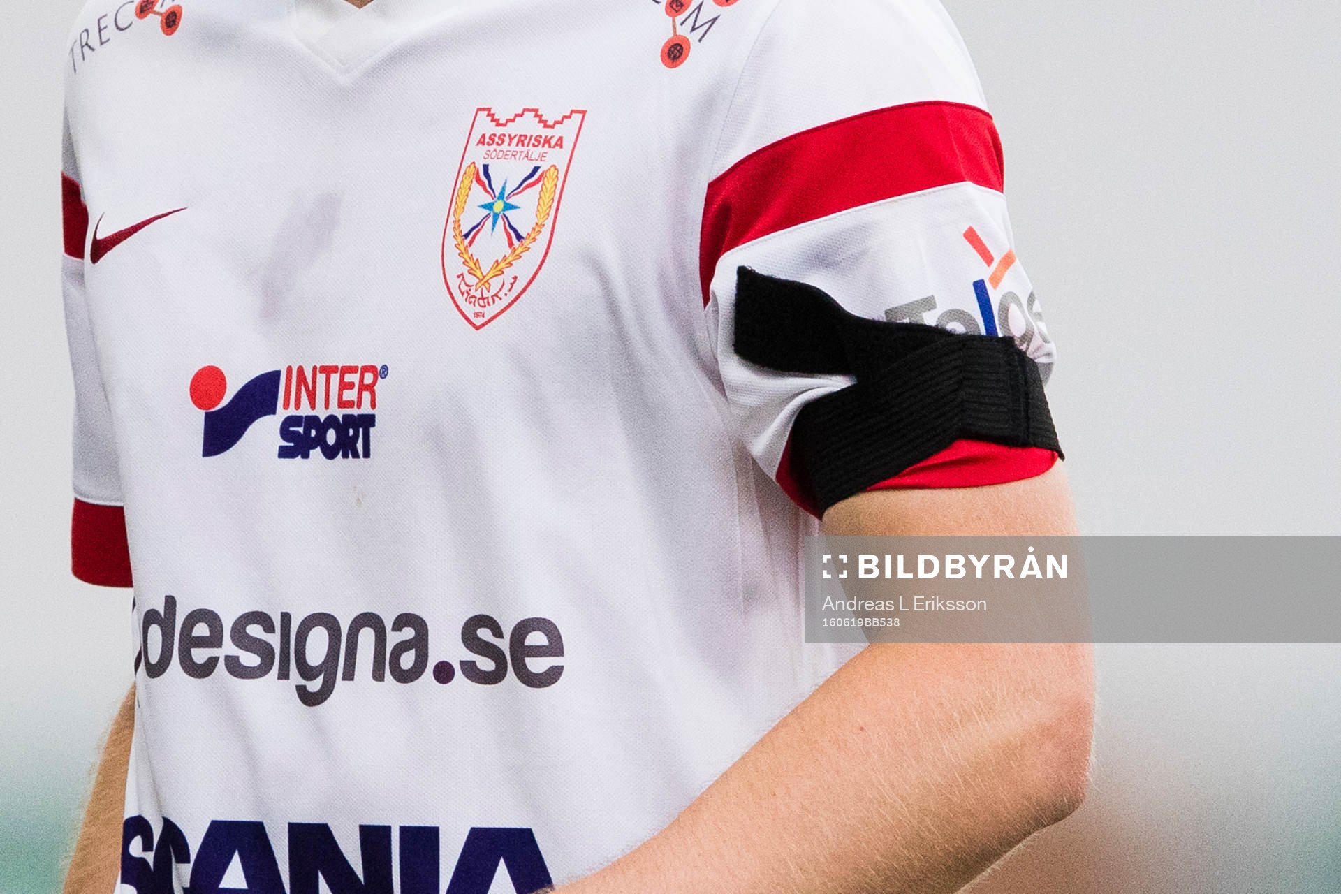 Assyriskas spelare med sorgband