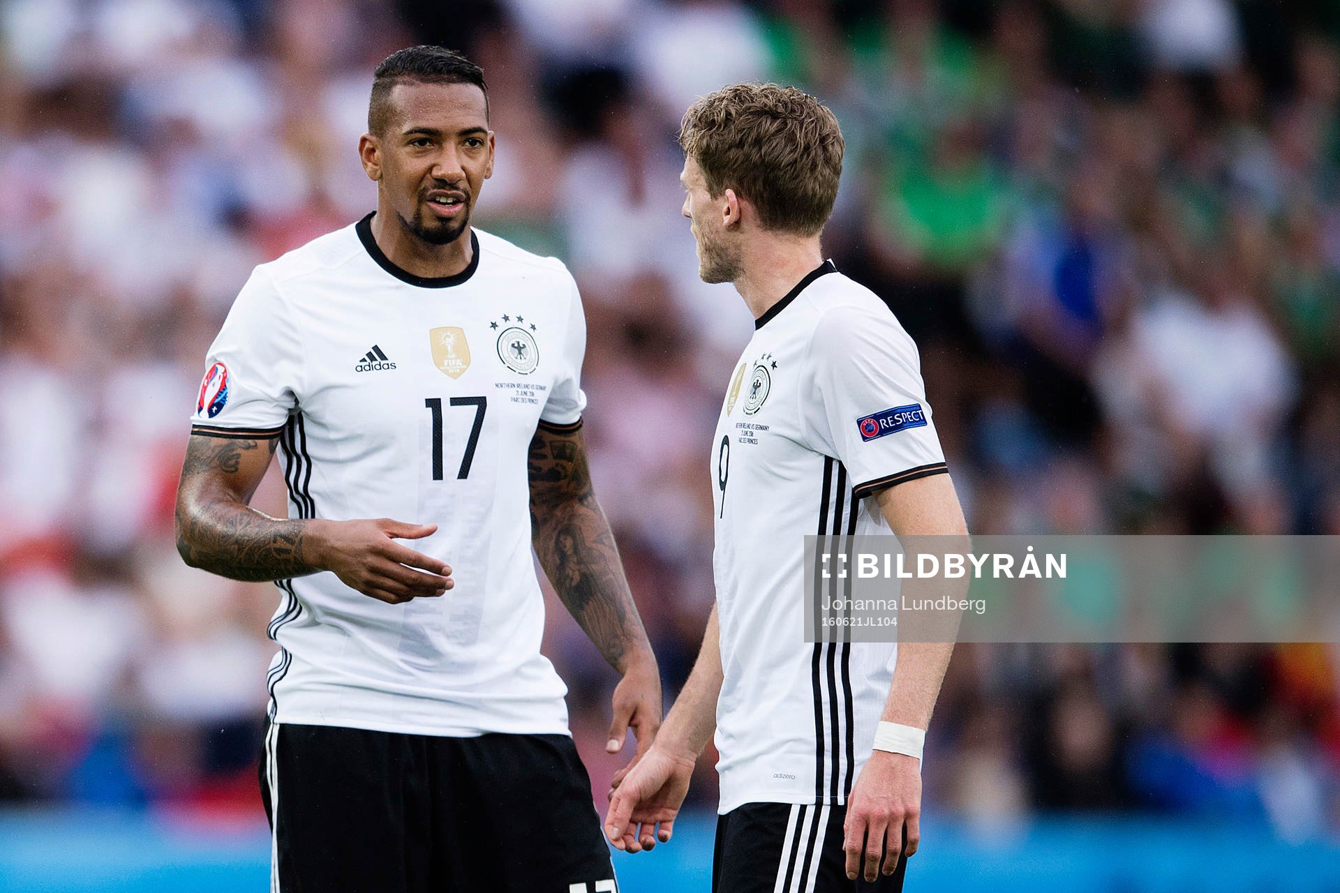 Tysklands Jerome Boateng pratar med André Schurrle i