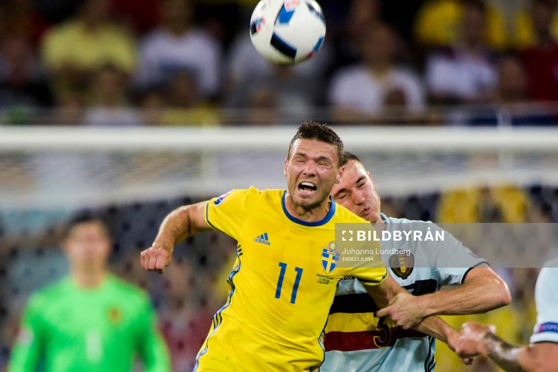 Sveriges Marcus Berg och Belgiens Thomas Vermaelen i