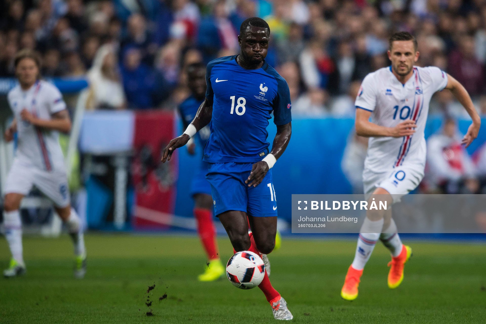 Frankrikes Moussa Sissoko och Islands Gylfi Sigurdsson