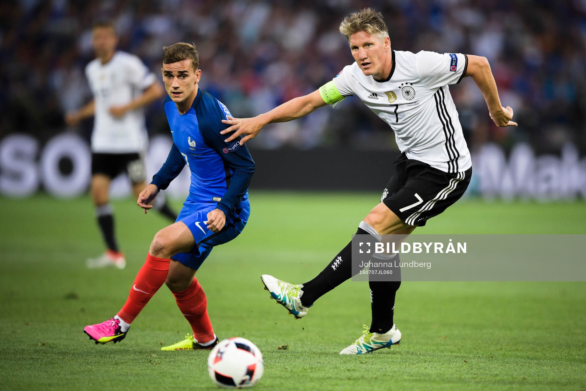 Frankrikes Antoine Griezmann och Tysklands Bastian