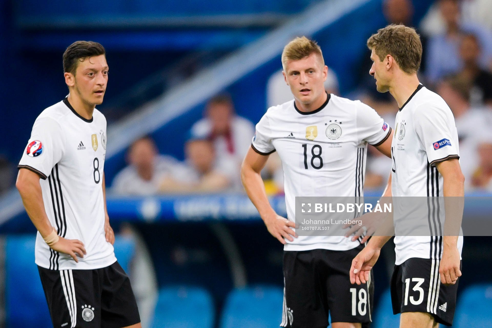 Tysklands Mesut Özil , Toni Kroos och Thomas Muller deppar
