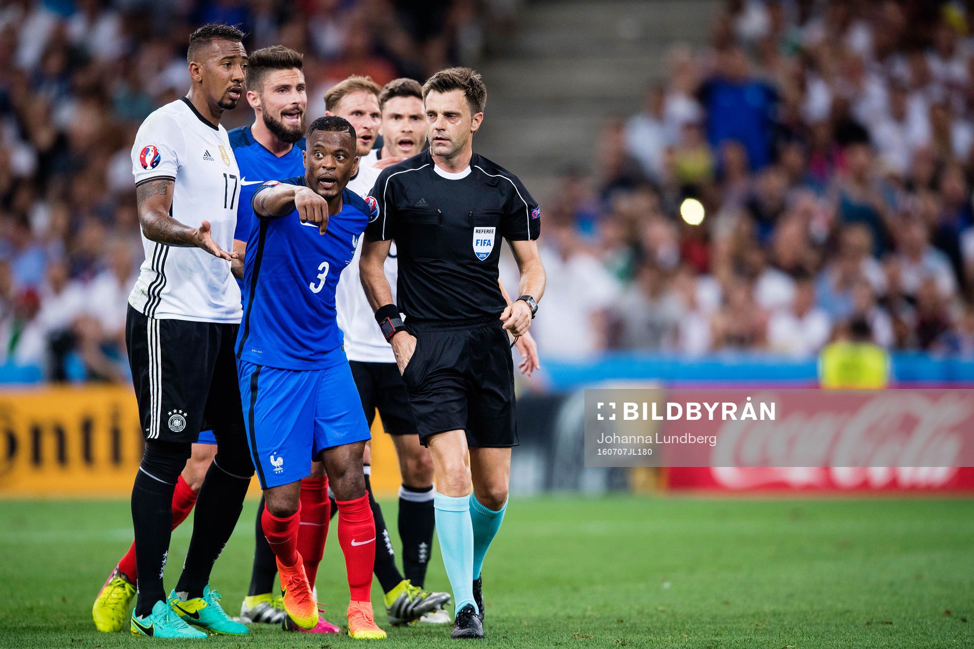 Frankrikes Patrice Evra och Tysklands Jerome Boateng