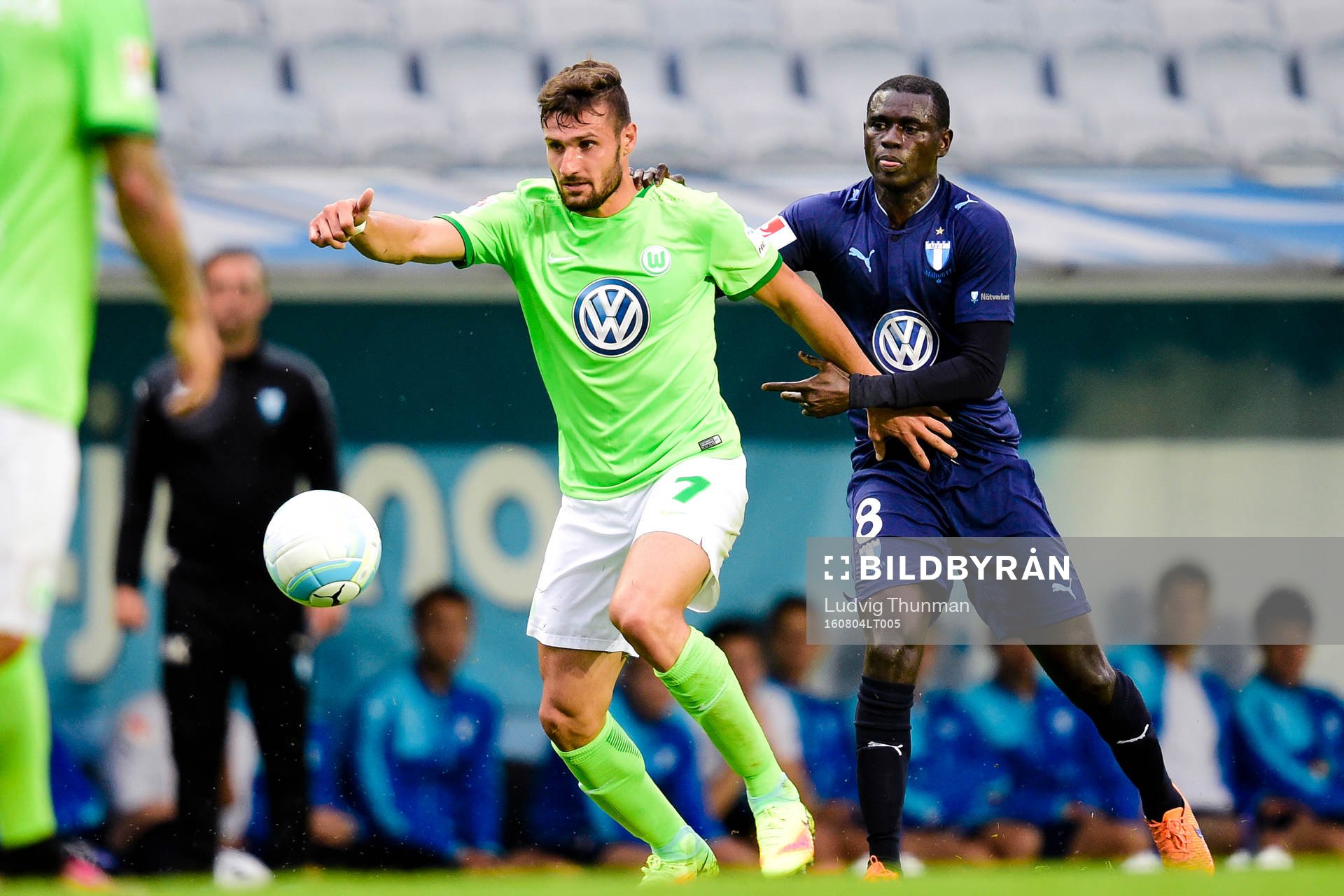 Wolfsburgs Daniel Caligiuri och Malmö FFs Enock Kofi Adu
