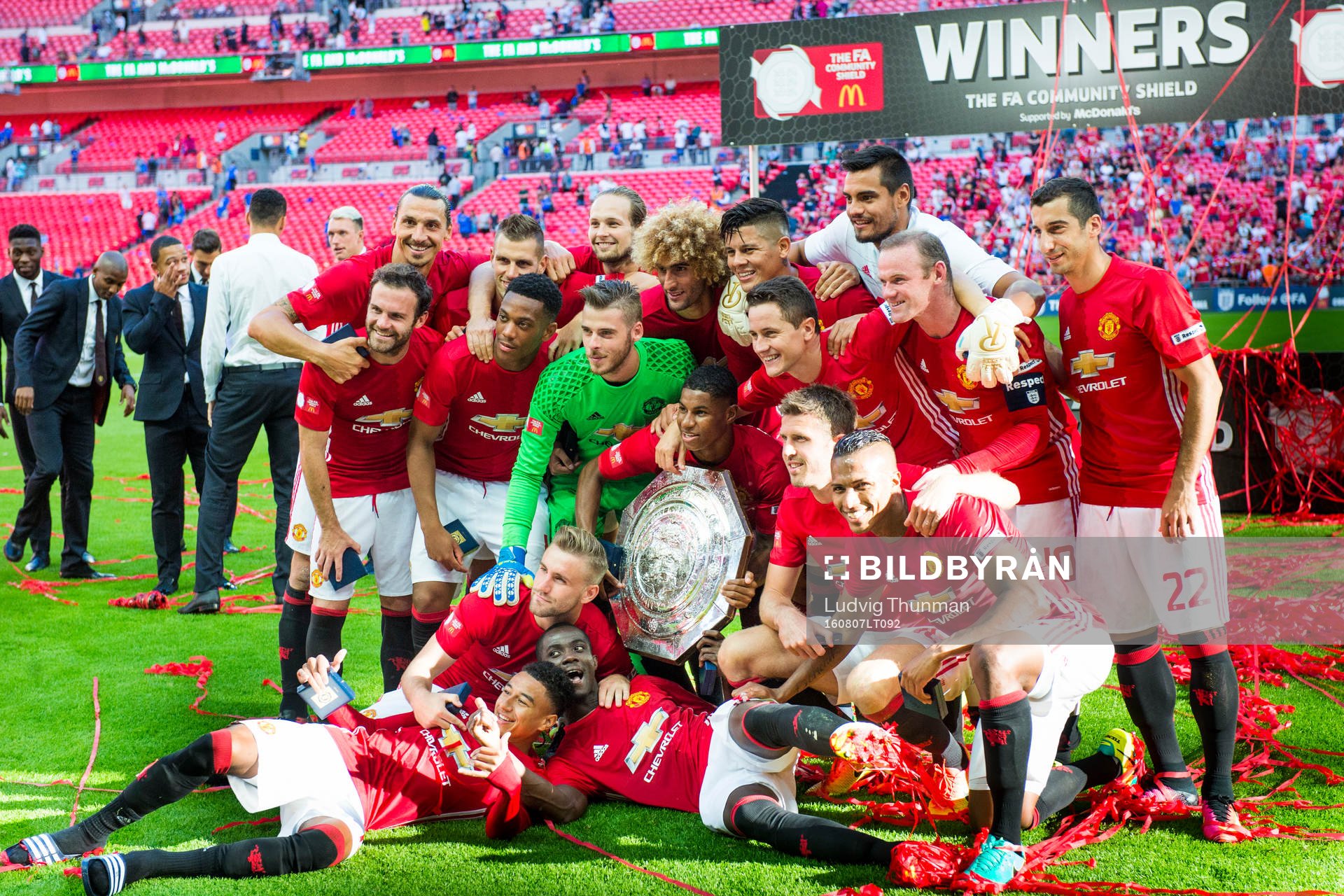 Manchester Uniteds spelare firar