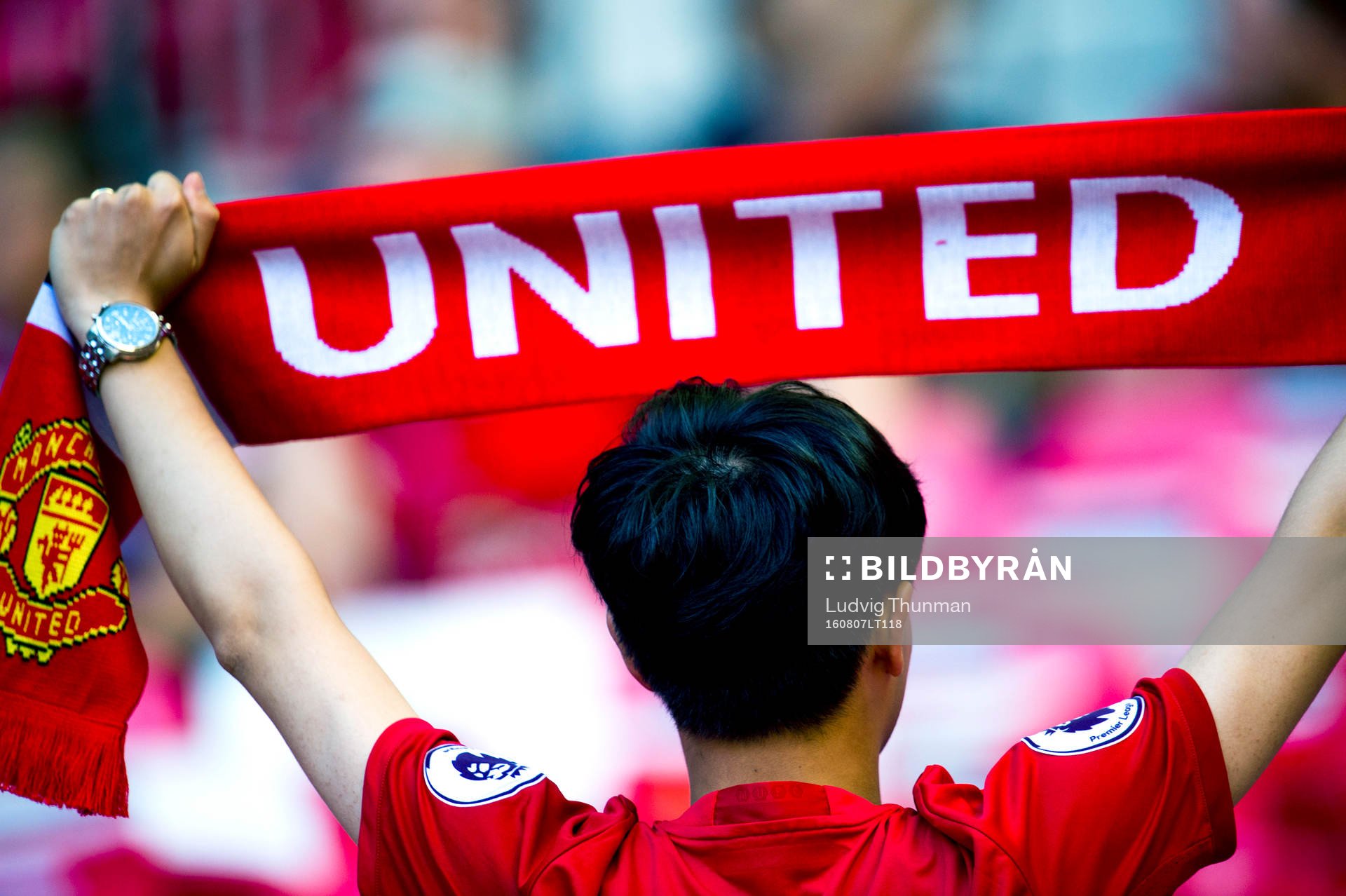 En Manchester United supporter med en holdup