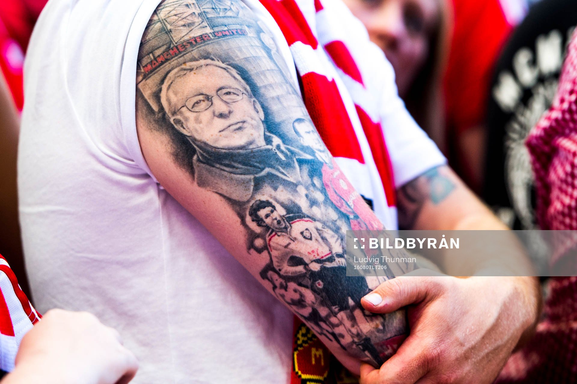 En Manchester United supporter med tatuering