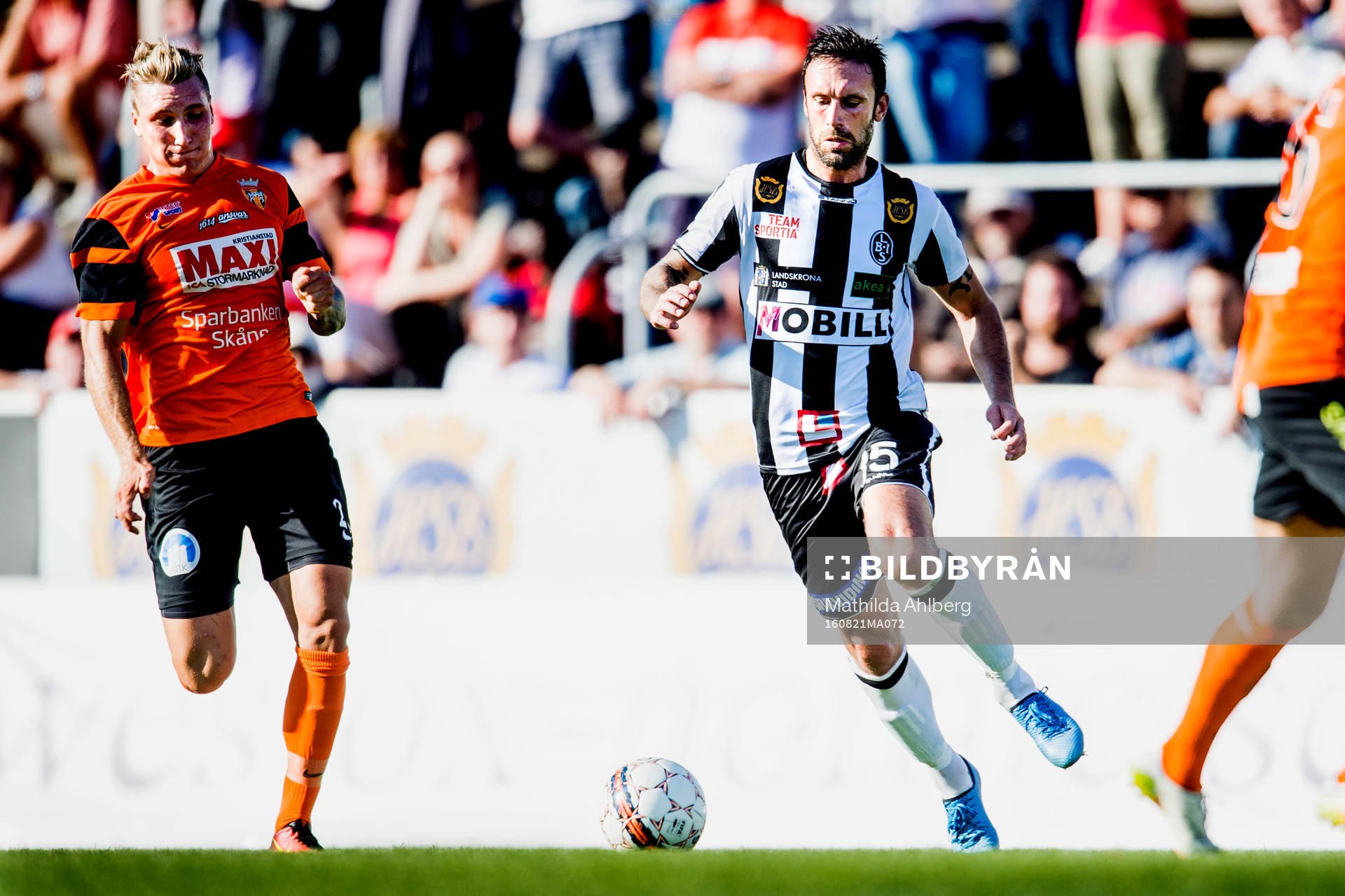 Kristianstads Anton Bloom och Landskronas Rade Prica i duell om bollen under fotbollsmatchen i division 1 mellan Landskrona och Kristianstad den 21 augusti 2016 i Landskrona.