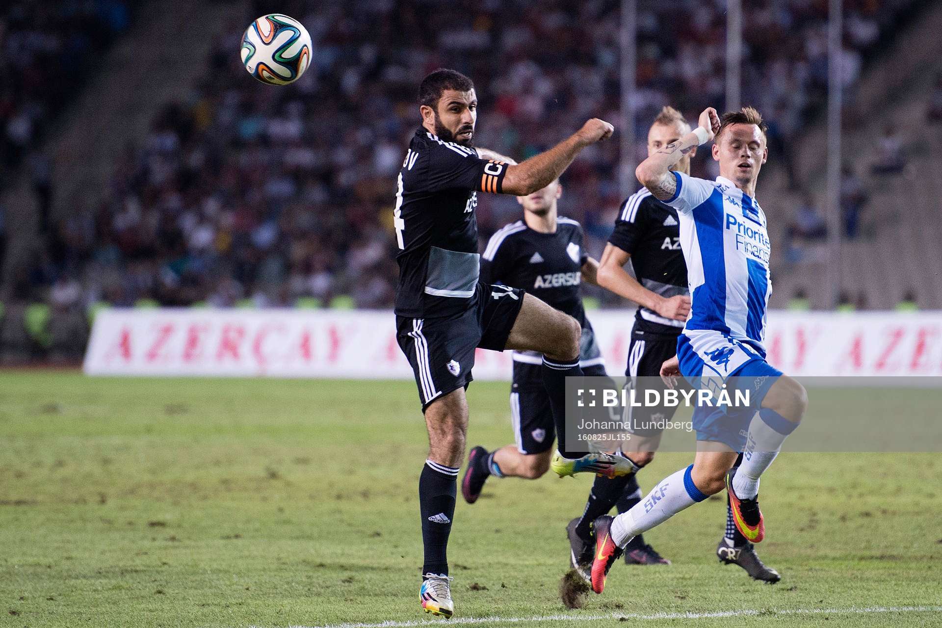 Karabachs Rashad Sadygov och IFK Göteborgs Jakob Ankersen under fotbollsmatchen i kvalet till Europa League mellan Karabach och IFK Göteborg den 25 augusti 2016 i Baku.