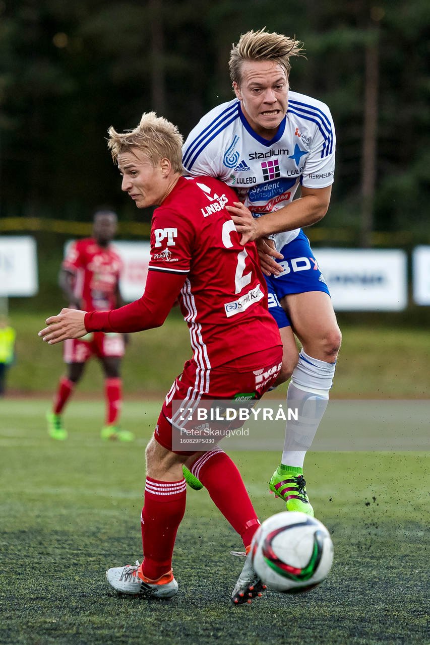 s Henrik Millbert stoppar Luleå:s Emil Johansson