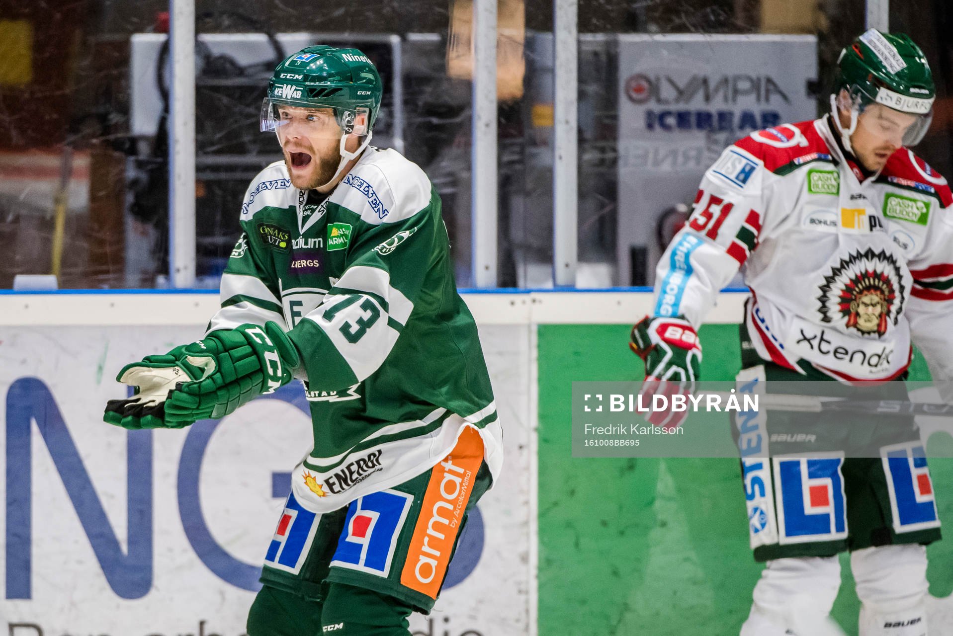 Färjestads Anton Grundel och Frölundas Mats Rosseli Olsen