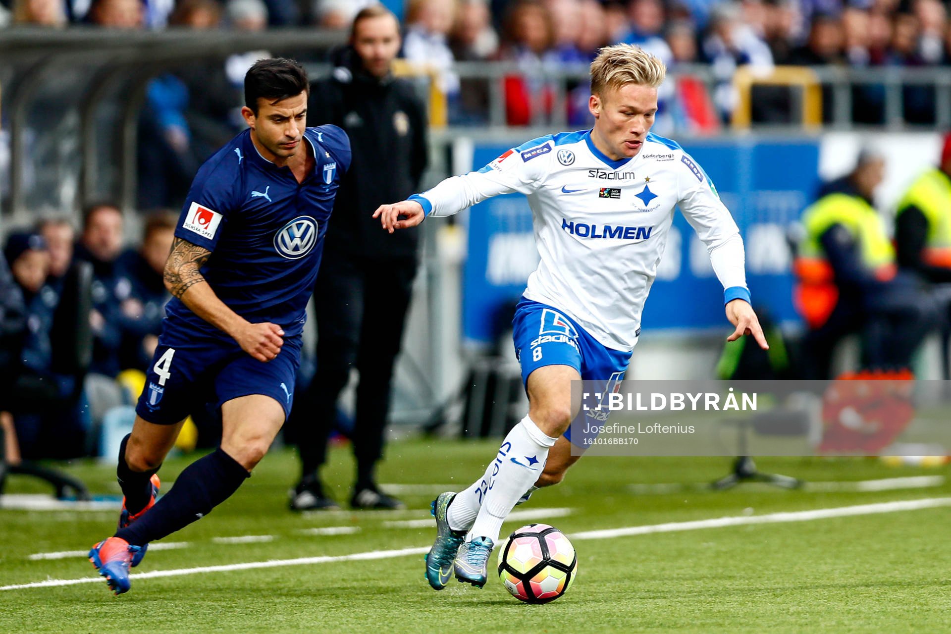 Norrköpings Nicklas Bärkroth och Malmö FFs Behrang Safari