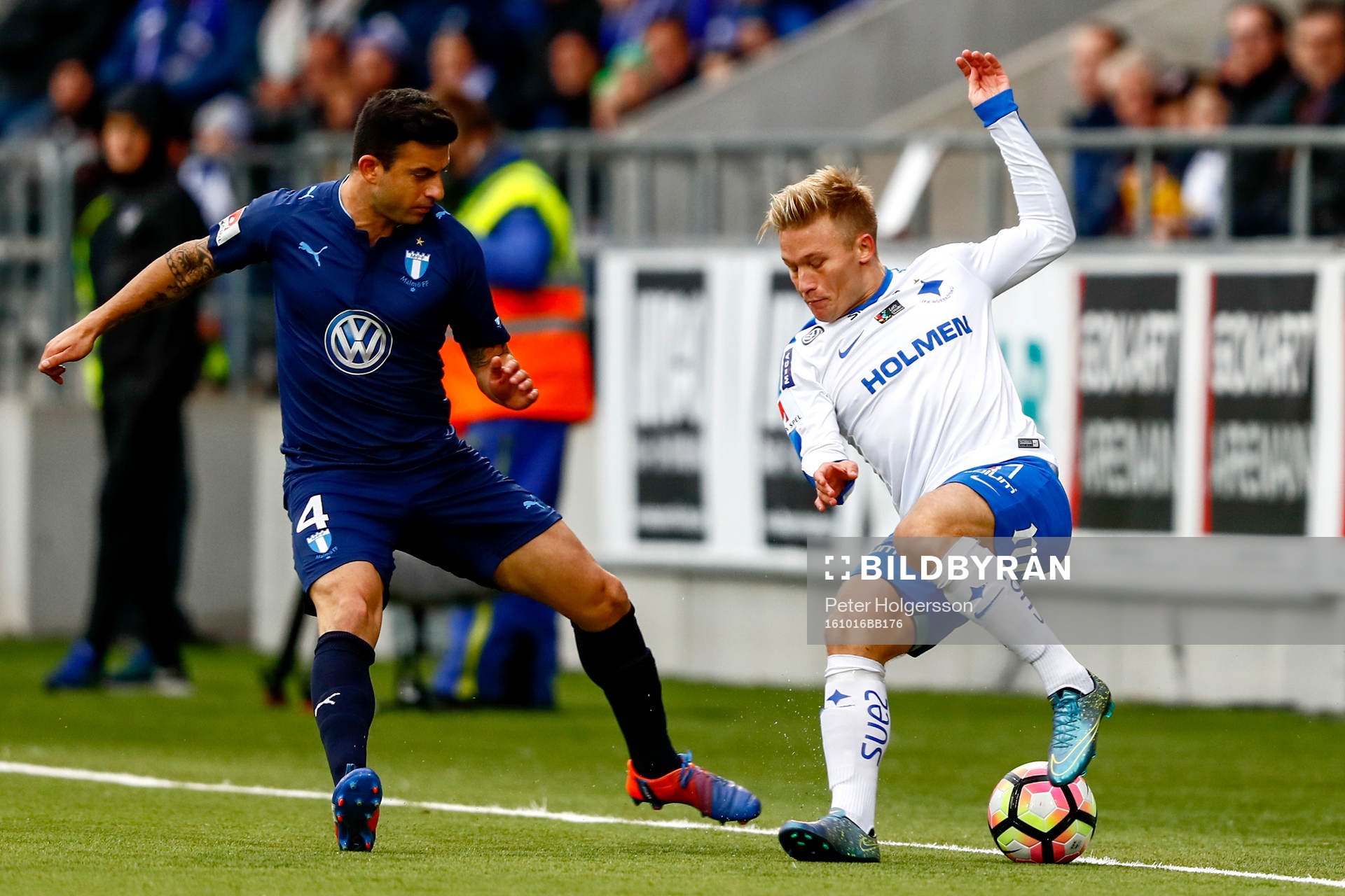 Norrköpings Nicklas Bärkroth och Malmö FFs Behrang Safari