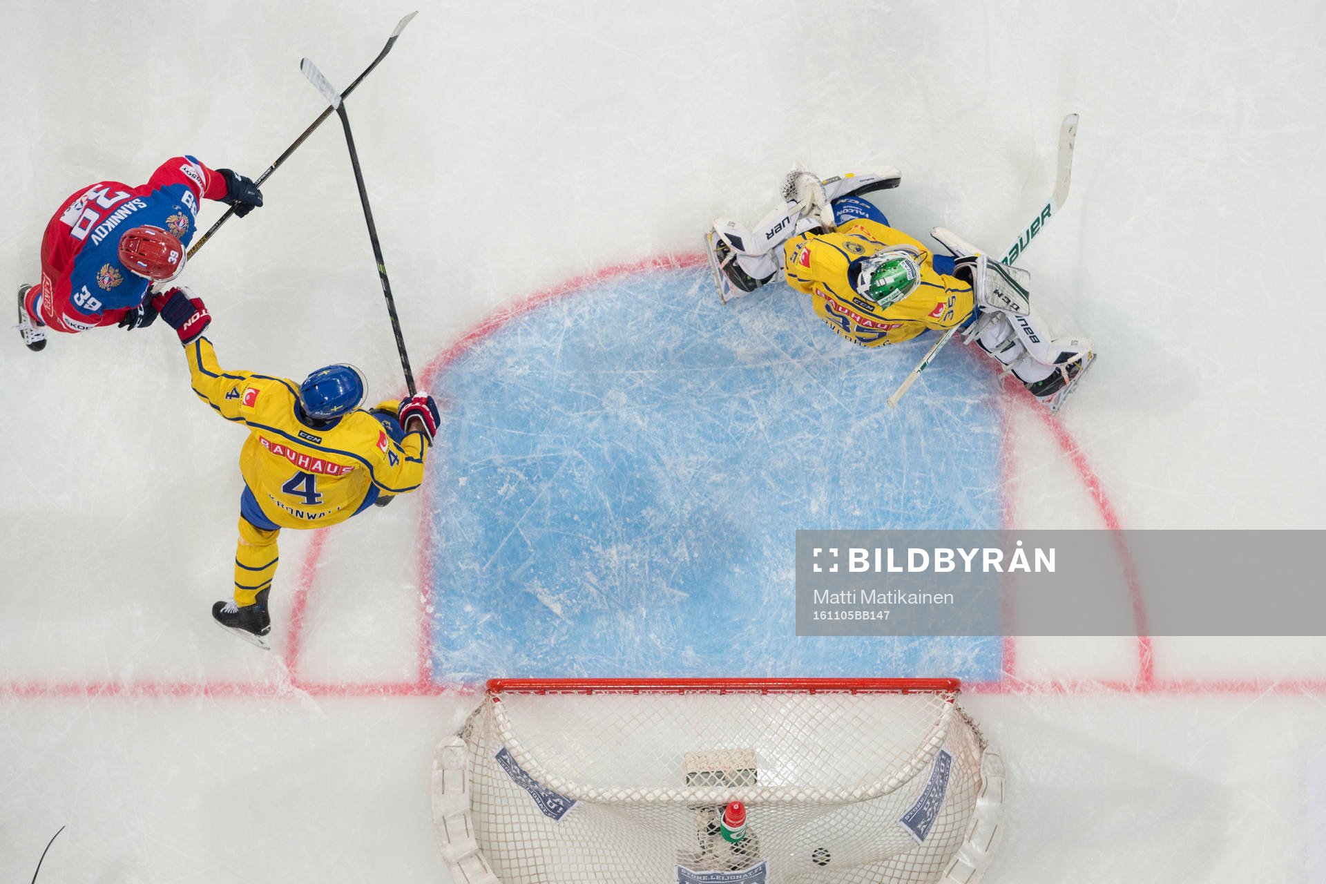 Stepan Sannikov, RUS, Staffan Kronwall, SWE and Niklas
