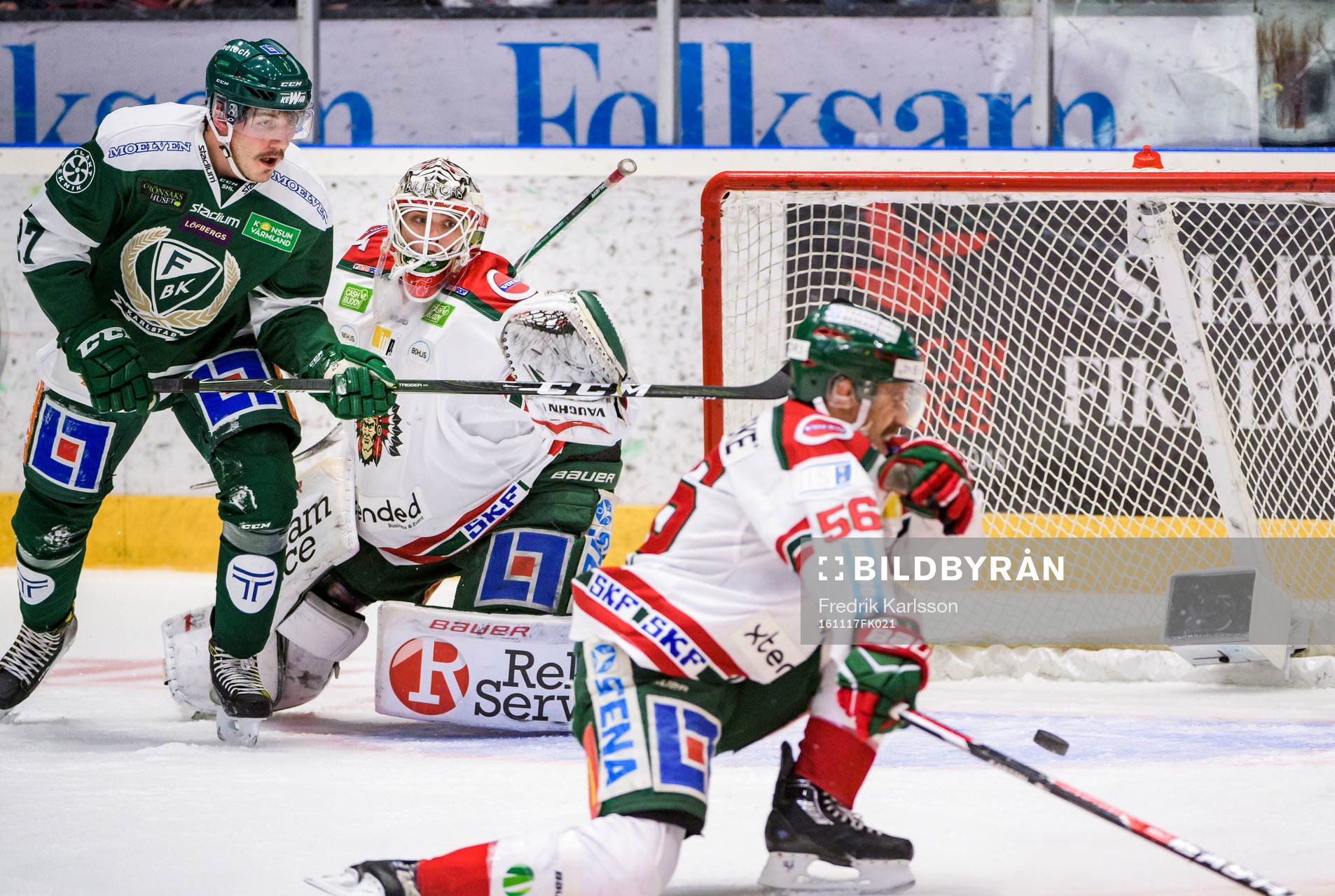 Färjestads John Persson målvakt Johan Gustafsson och