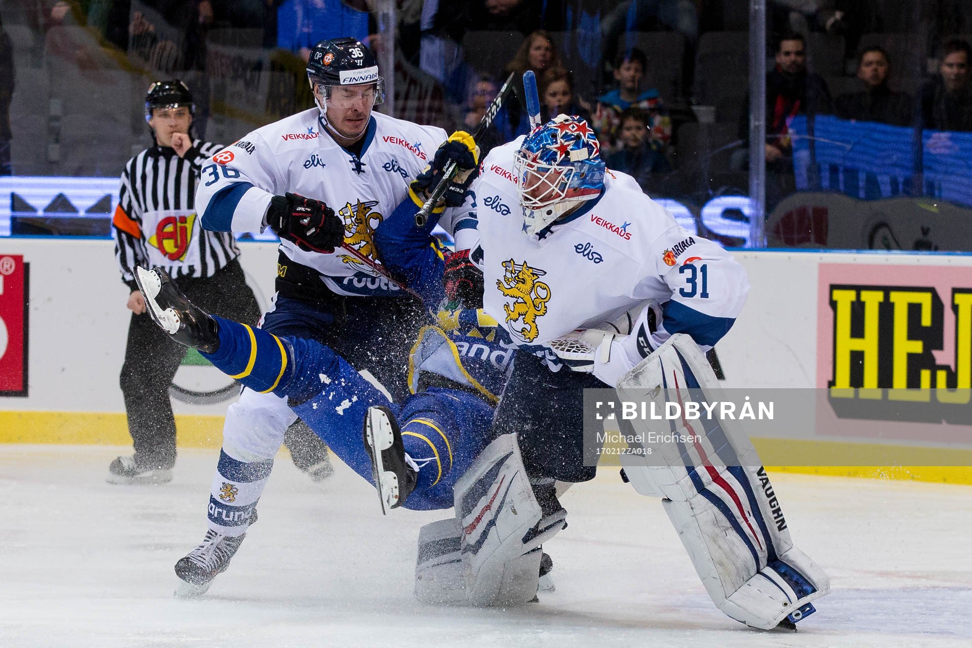Finlands Joonas Järvinen och målvakt Mikko Koskinen