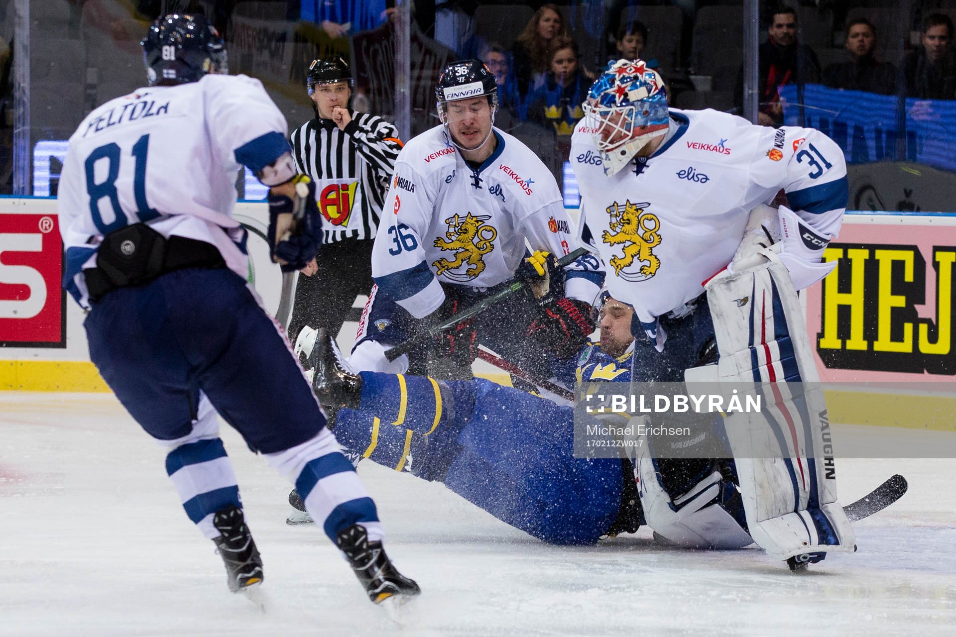 Finlands Joonas Järvinen och målvakt Mikko Koskinen