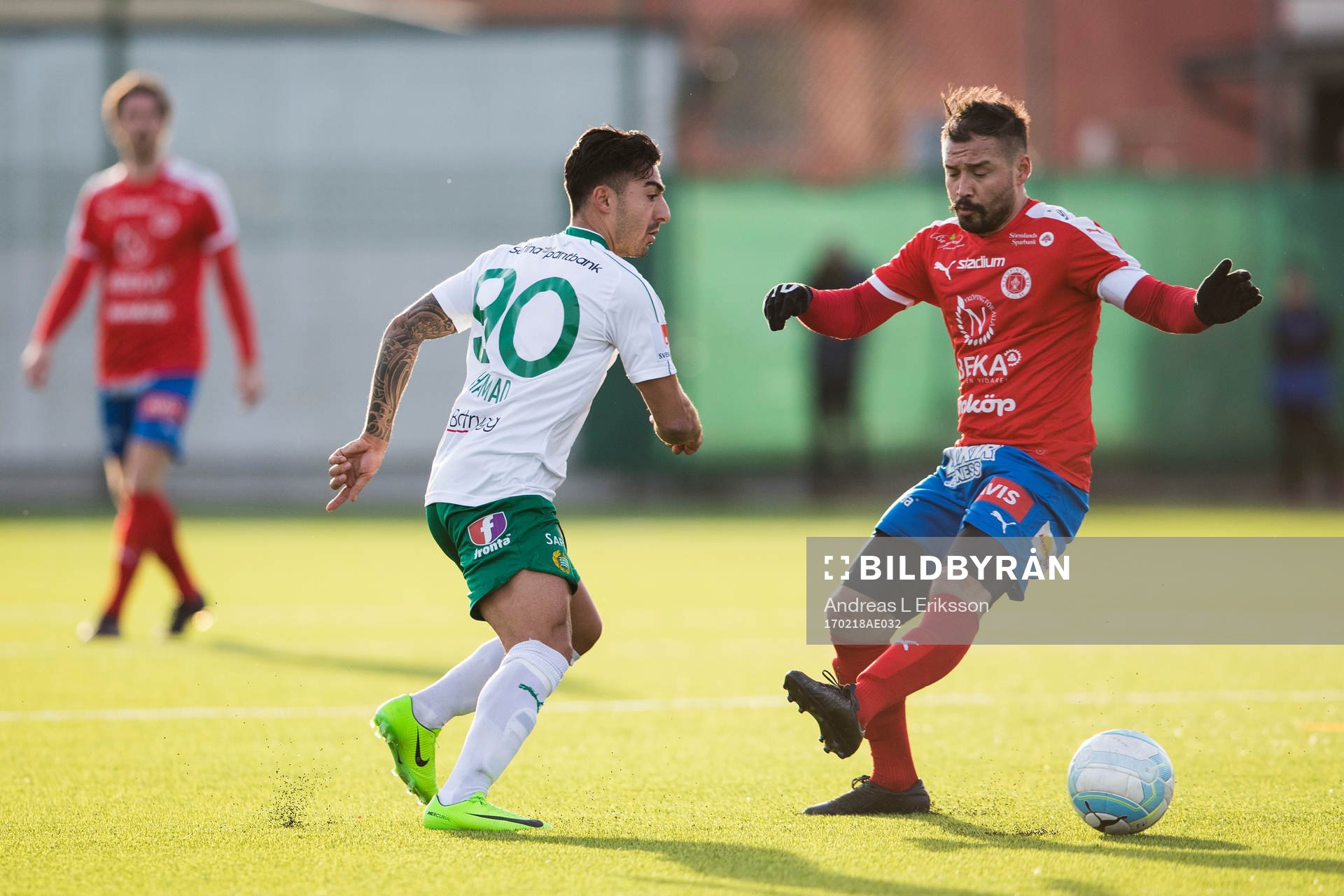 Hammarbys Jiloan Hamad passar förbi Nyköpings Dago Funes under fotbollsmatchen i Svenska Cupen mellan Nyköping och Hammarby den 18 februari 2017 i Nyköping.