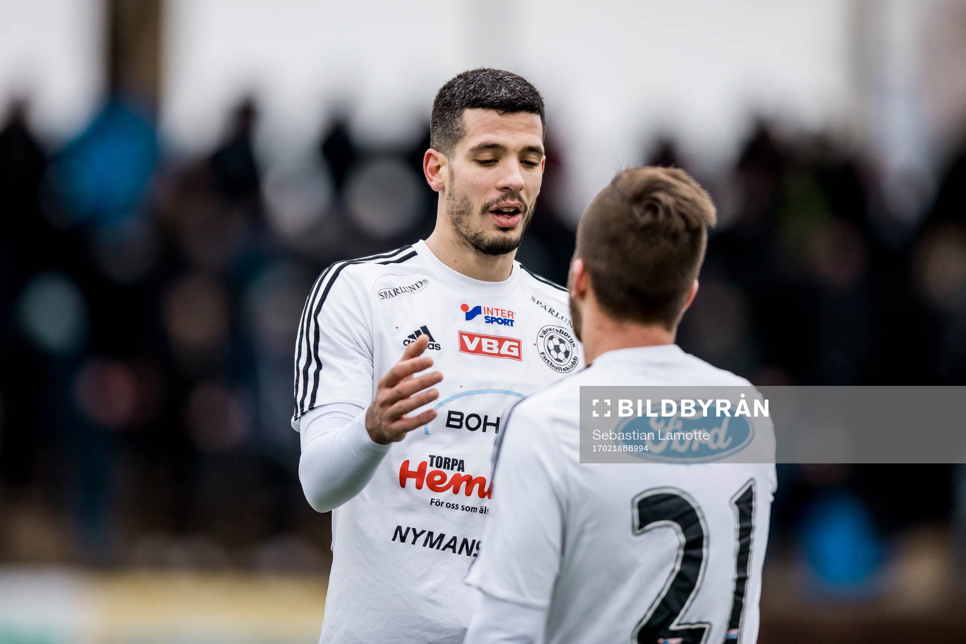 Vänersborgs Andelo Vekic och Andrew Palumbo jublar efter matchen under fotbollsmatchen i gruppspelet i Svenska Cupen mellan Vänersborg och Halmstad den 18 februari 2017 i Vänersborg.