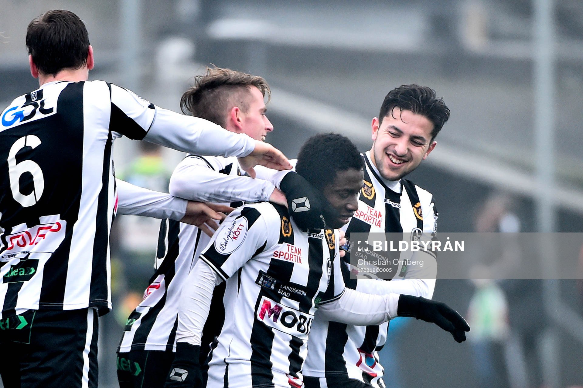 Landskronas Philip Andersson, Saber Azizi och Rasmus Alm kramar om målskytten Thierry Zahui efter 1-0 under fotbollsmatchen i Svenska cupen mellan Landskrona och Gefle den 19 februari 2017 i Landskrona.